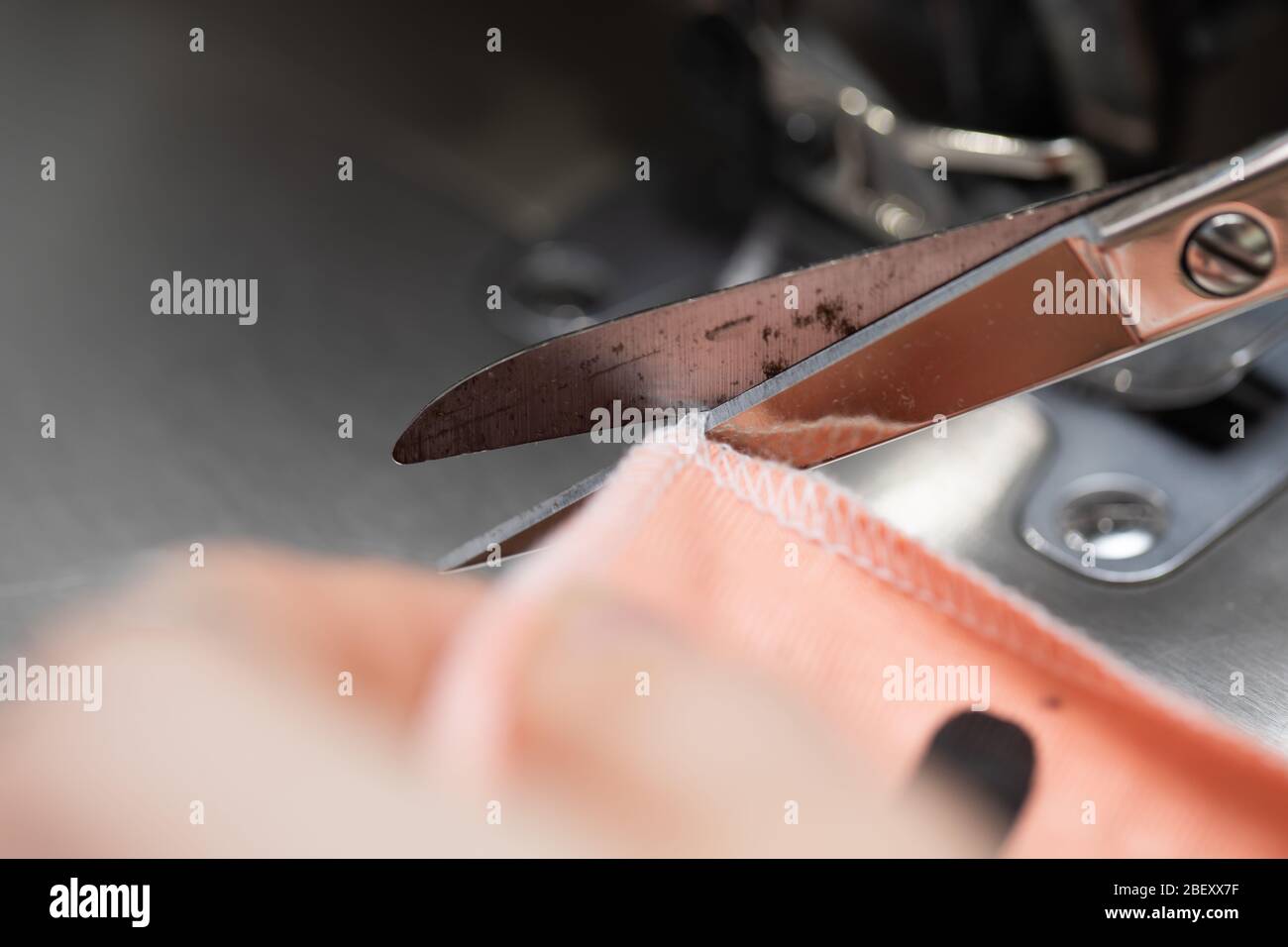 Additional seamstress work requires high manual dexterity Stock Photo