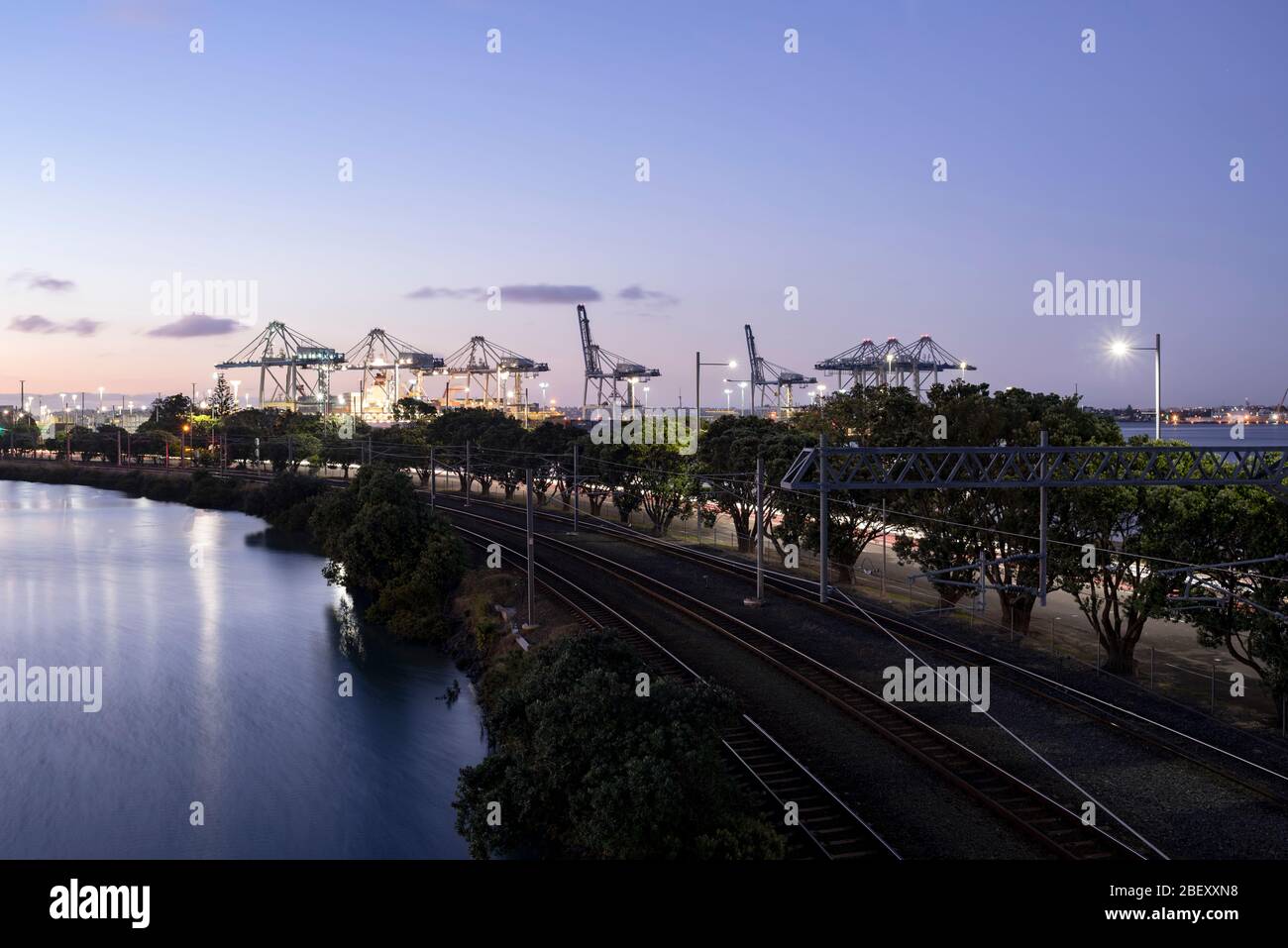 Judges Bay, Auckland. View of Eastern Line and Ports of Auckland at dusk Stock Photo