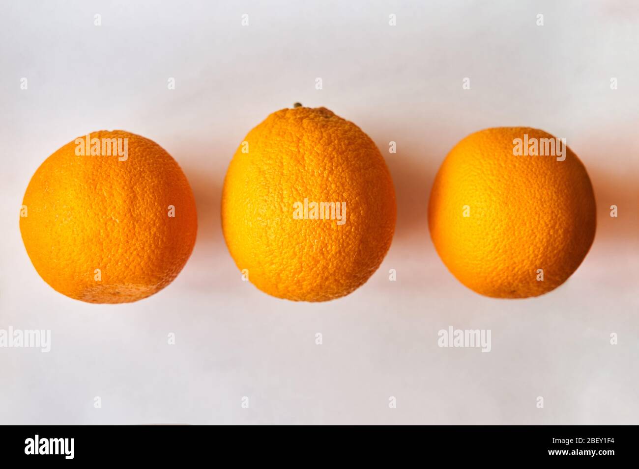 A group of oranges on a table Stock Photo