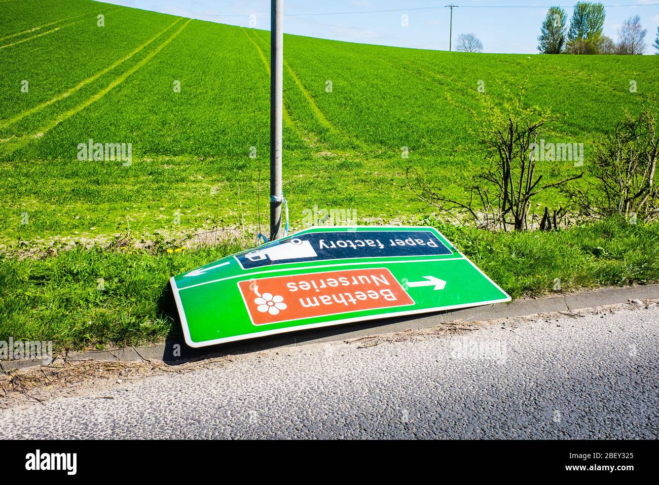 Knocked over and abandoned road sign UK Stock Photo Alamy