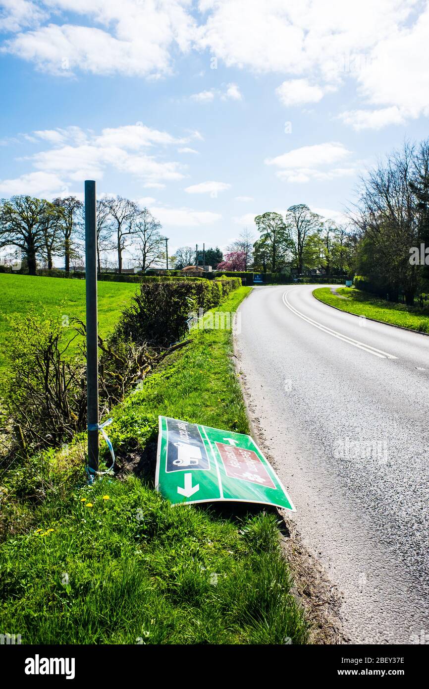 Knocked over and abandoned road sign UK Stock Photo Alamy