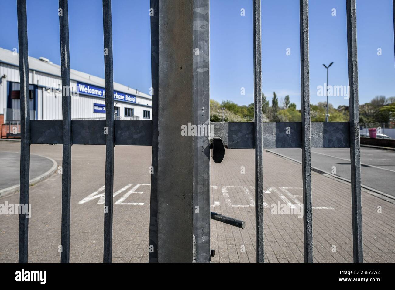 NOTE: IMAGE 27 OF A SET OF 35 IMAGES FEATURING LOCKED GATES OF BUSINESSES AND PLACES THAT ARE CLOSED DURING UK LOCKDOWN A padlock closes the gates to a Carbase car supermarket in Bristol to prevent access as the UK continues in lockdown to help curb the spread of the coronavirus. Stock Photo