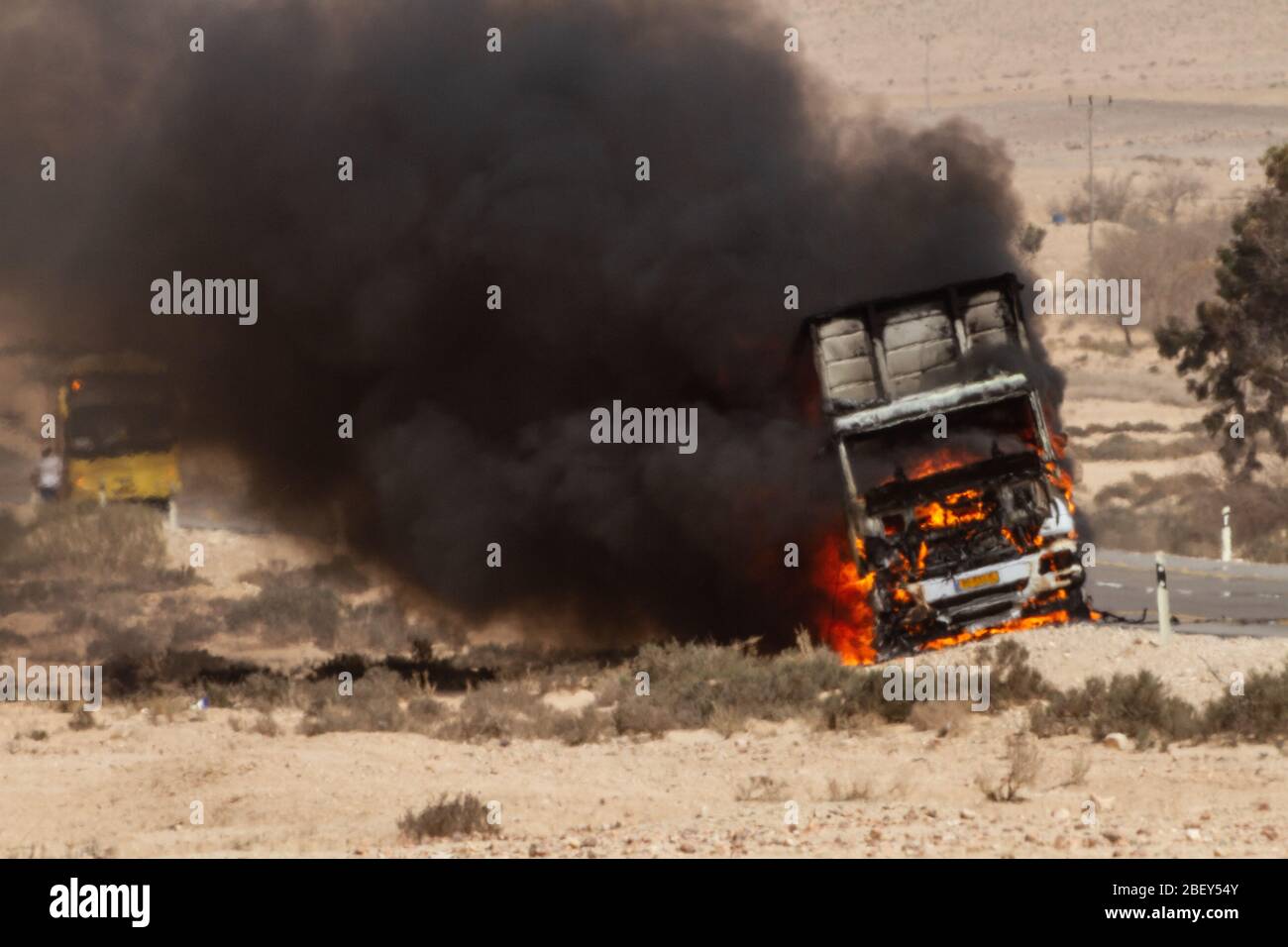 Flames and smoke engulf a burning truck. The truck wad ignited by a kite bomb dispatched from Gaza. Photographed on the Israel Gaza Border in April 20 Stock Photo