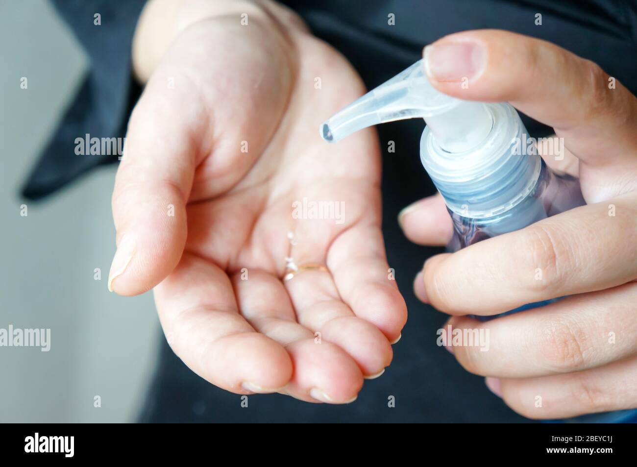 women washing hands with alcohol gel or antibacterial soap disinfectant ...