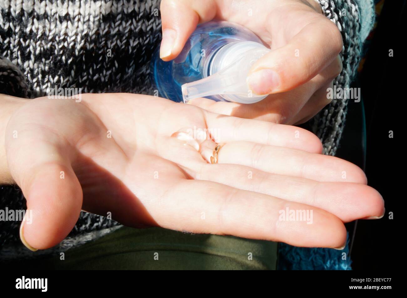 women washing hands with alcohol gel or antibacterial soap disinfectant ...