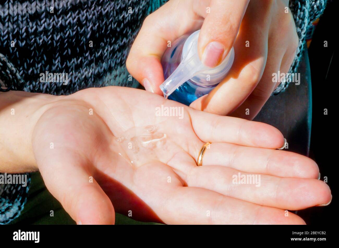 women washing hands with alcohol gel or antibacterial soap disinfectant ...