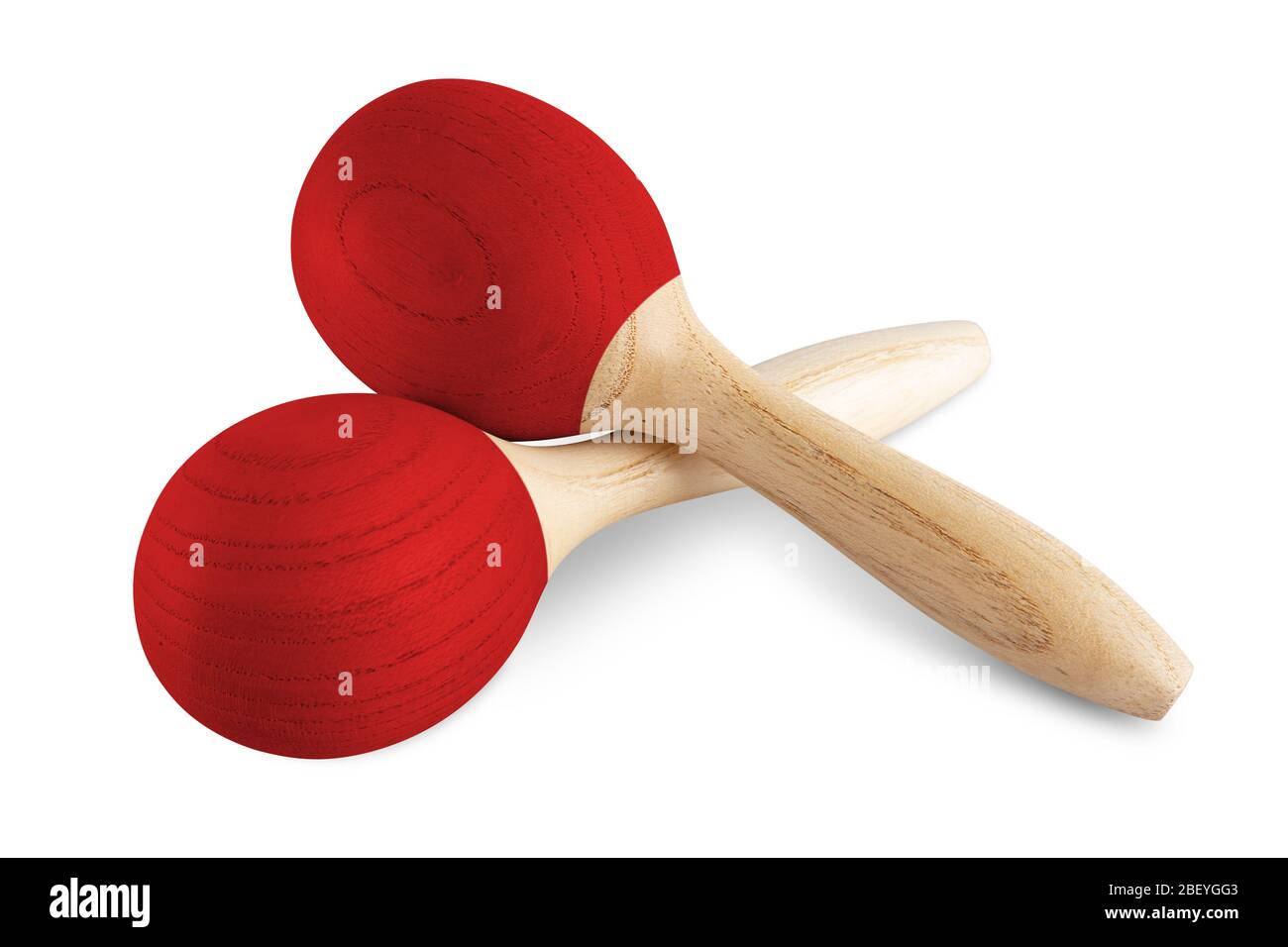 Pair of red wooden maracas hand shaker music instrument isolated on white background. rattle percussion carnival rythm party concept. Stock Photo