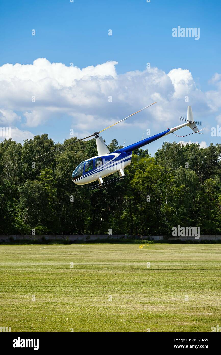 passenger helicopter flies at an air show Stock Photo