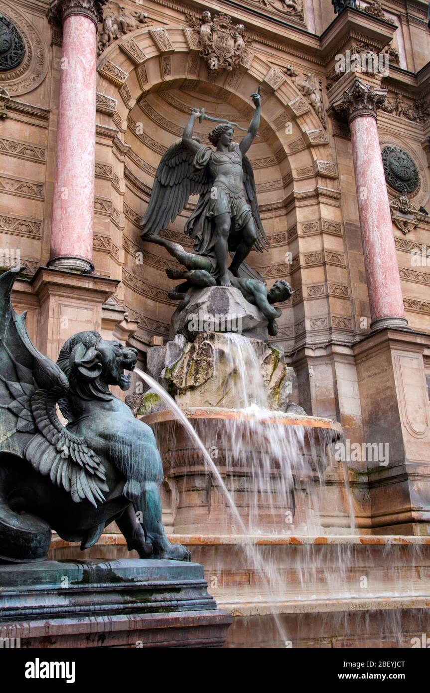 Latin Quarter monumental fountain in Paris, Fontaine Sant-Michel is a duel between the Archangel Michael and the devil, France. Stock Photo