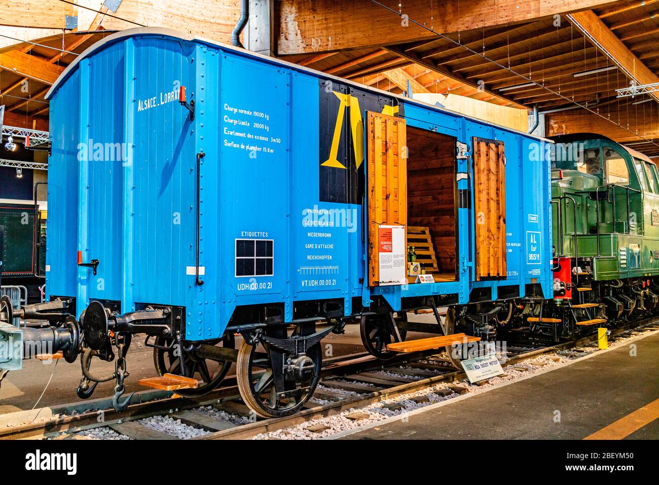 A wooden goods truck, now on display in the Cité du Train railway museum in Mulhouse, France. February 2020. Stock Photo