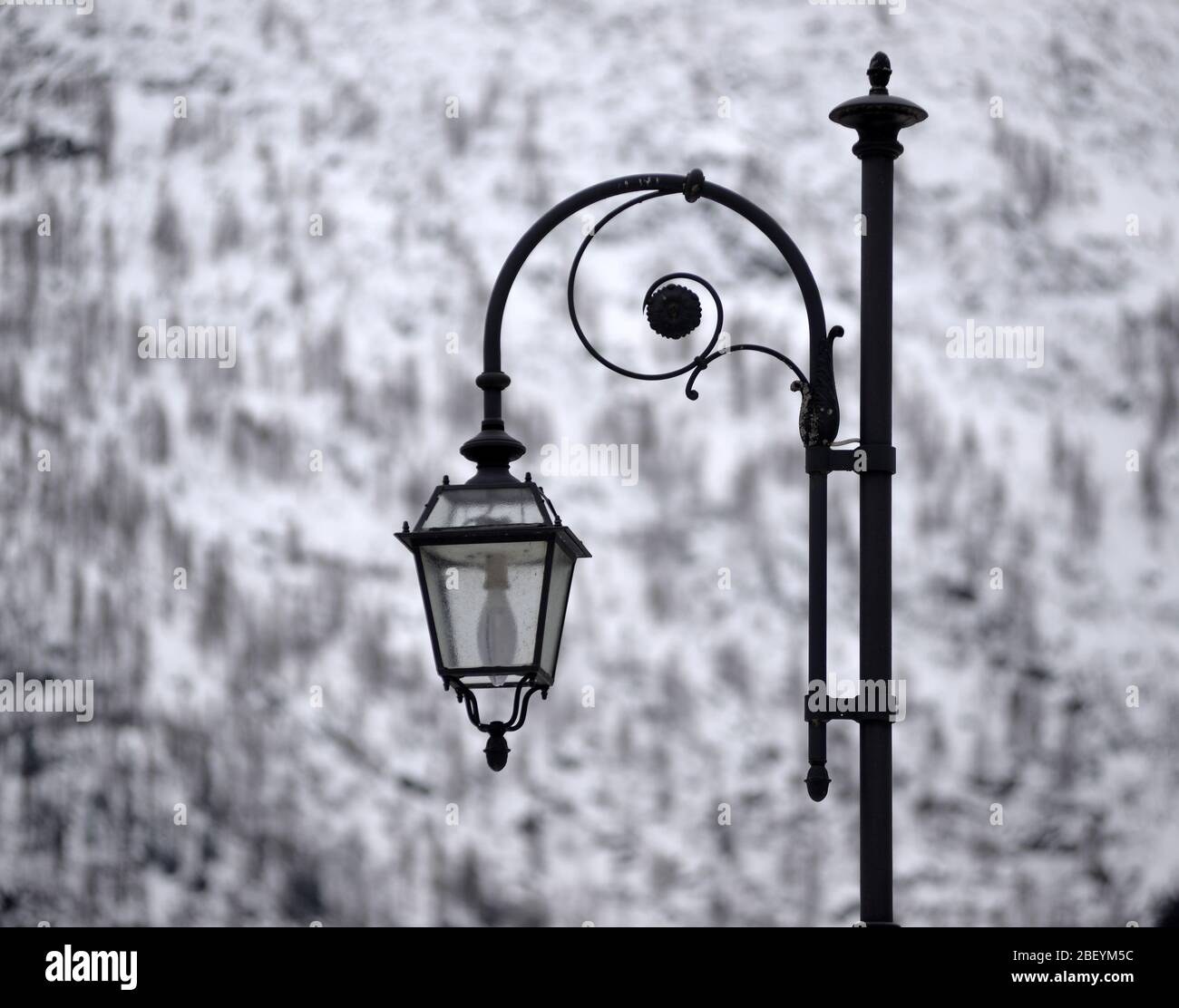 street lamp against the background of a winter landscape. Old fashioned  street lamp at night. Decorative lamps Stock Photo - Alamy