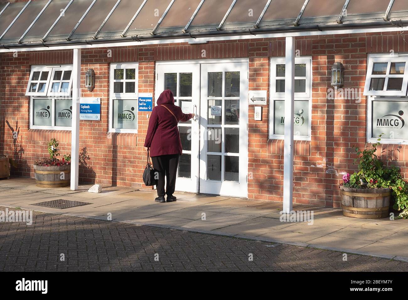 London, Britain. 16th Apr, 2020. A person enters Coplands Nursing Home