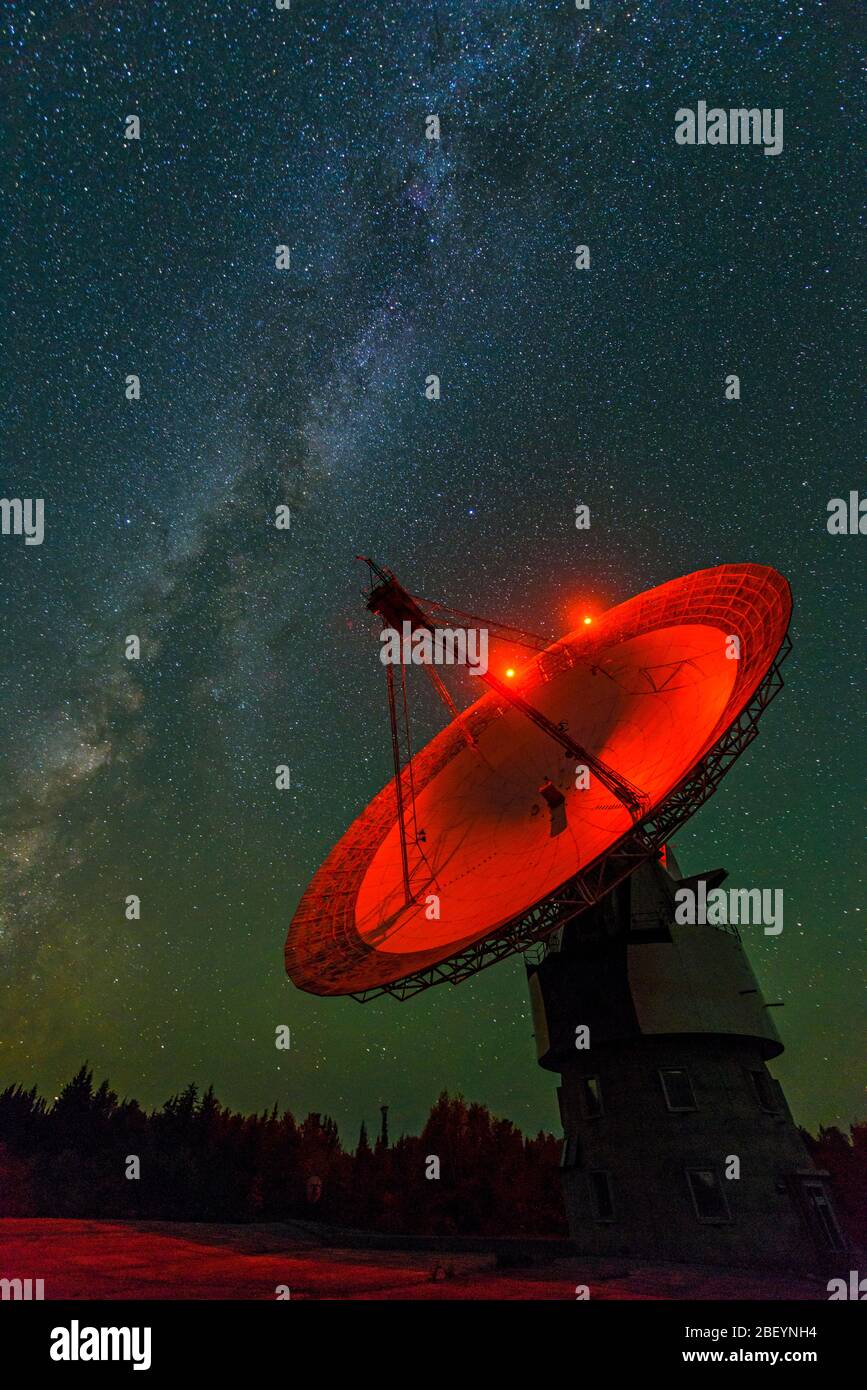 Night sky and the Radio telescope dish at Algonquin Radio Observatory