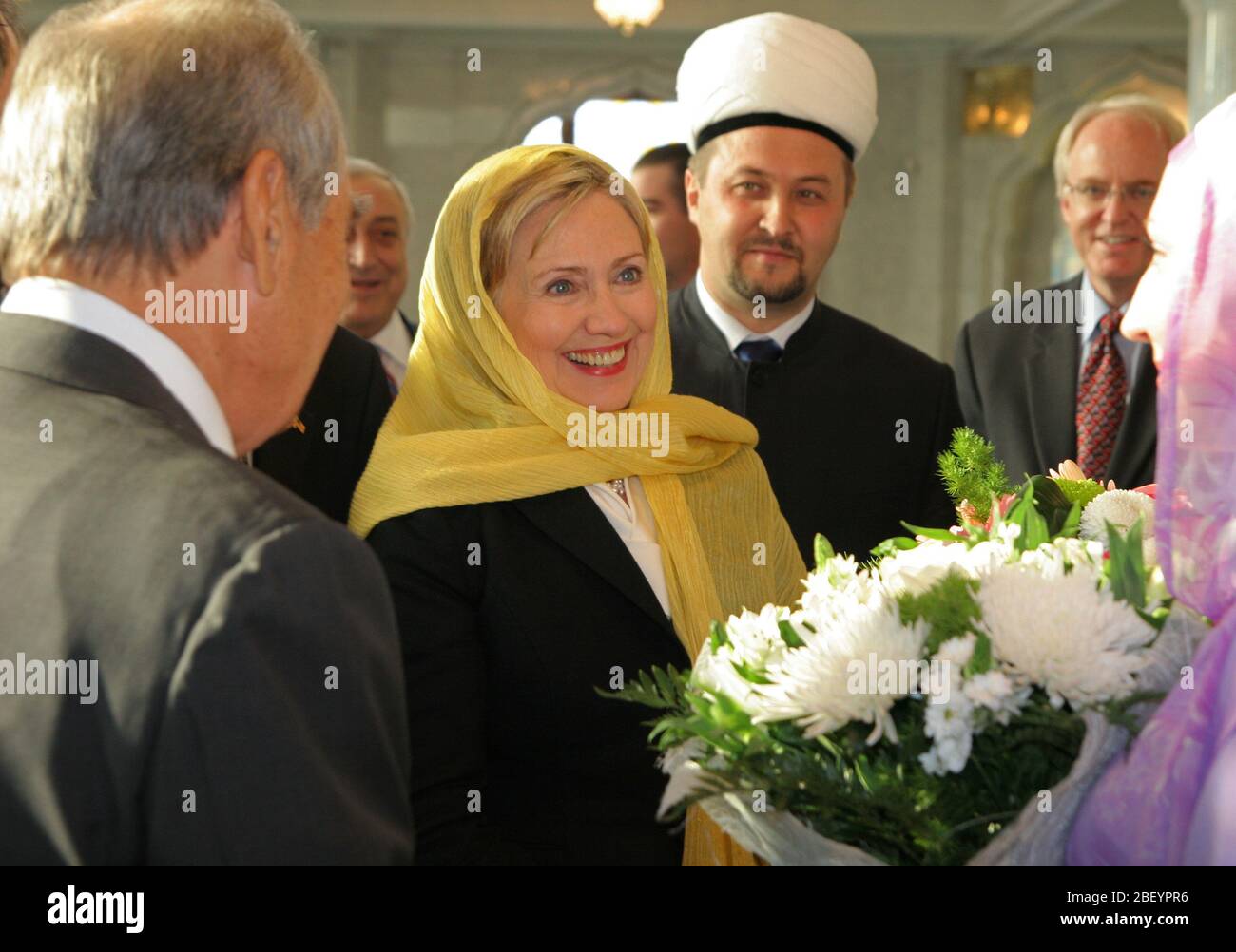 U.S. Secretary of State Hillary Rodham Clinton and Deputy Mufti Ramil Yunusov congratulate a newly wed couple in Kazan, Russia October 14, 2009. Stock Photo