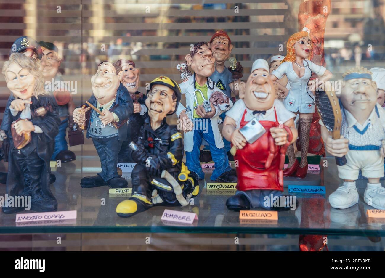 Funny figures for sale in a gift shop in Bologna, capital and largest city  of the Emilia Romagna region in Northern Italy Stock Photo - Alamy