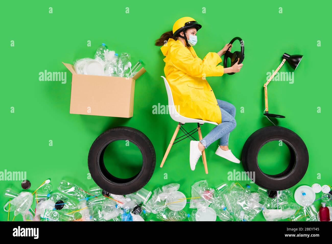 Full size high angle flat lay photo responsible citizen lady drive motor bike trash recycling center plastic products littered street nature earth Stock Photo