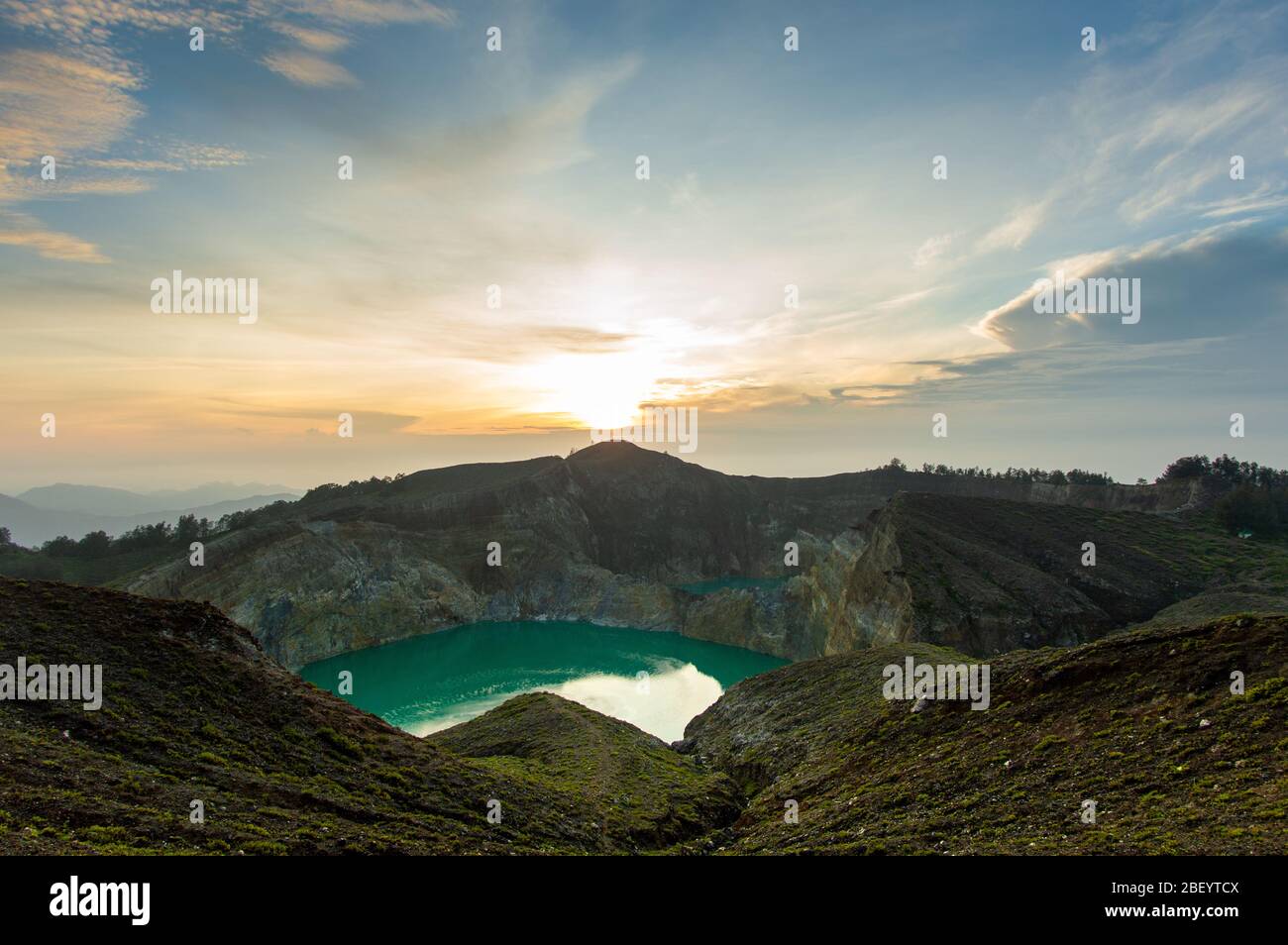 Blue Lake inside of the crater of the Kelimutu-Volcano on Flores island, Indonesia Stock Photo
