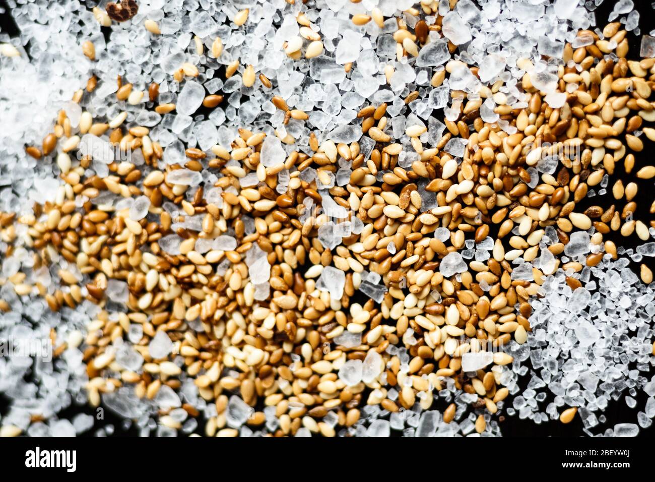 beautiful mixture of sesame and sea salt on a black background Stock Photo