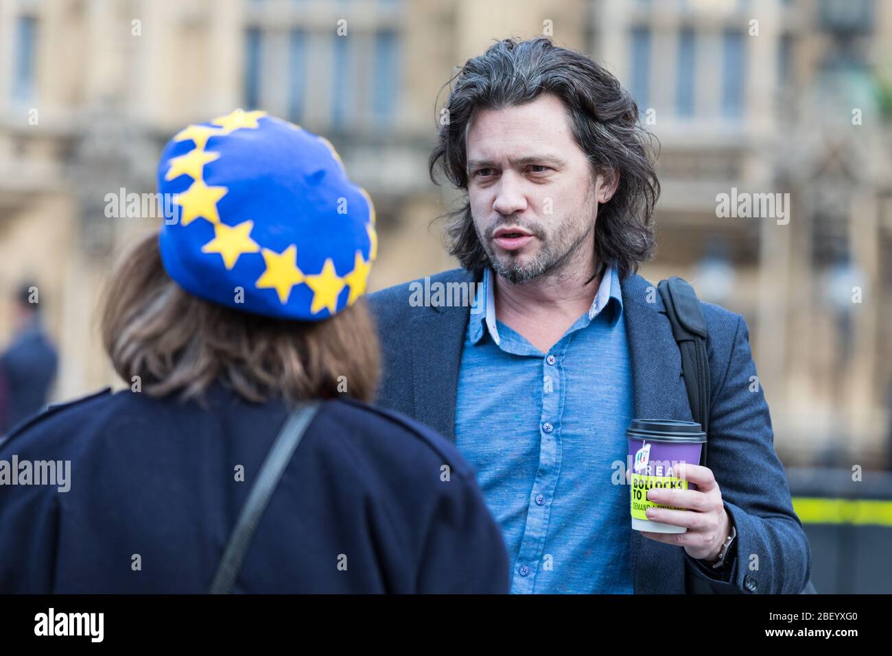 Mike Galsworthy, Scientist and European activist, speaks to a pro EU protester in Westmisnter, London, UK Stock Photo