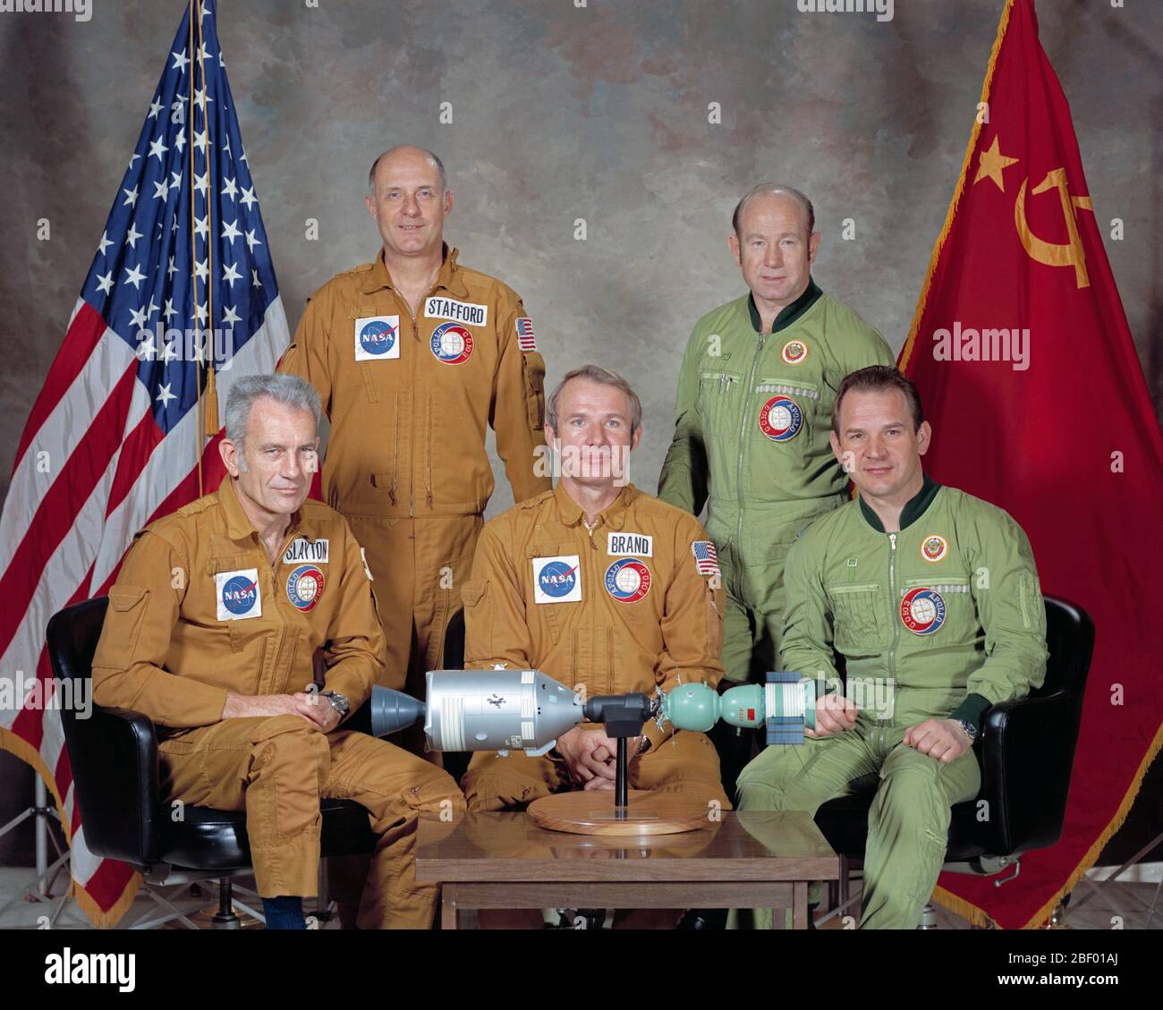 These five men composed the two prime crews of the joint United States-USSR Apollo-Soyuz Test Project (ASTP) docking mission in Earth orbit .  Thomas P. Stafford (standing left), cosmonaut Aleksey A. Leonov (standing righ Stock Photo