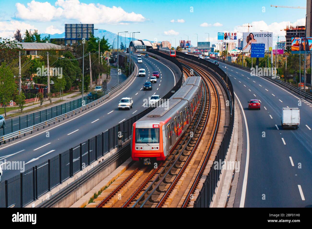 SANTIAGO, CHILE - NOVEMBER 2015: A Metro de Santiago train between two stations of Line 4 Stock Photo