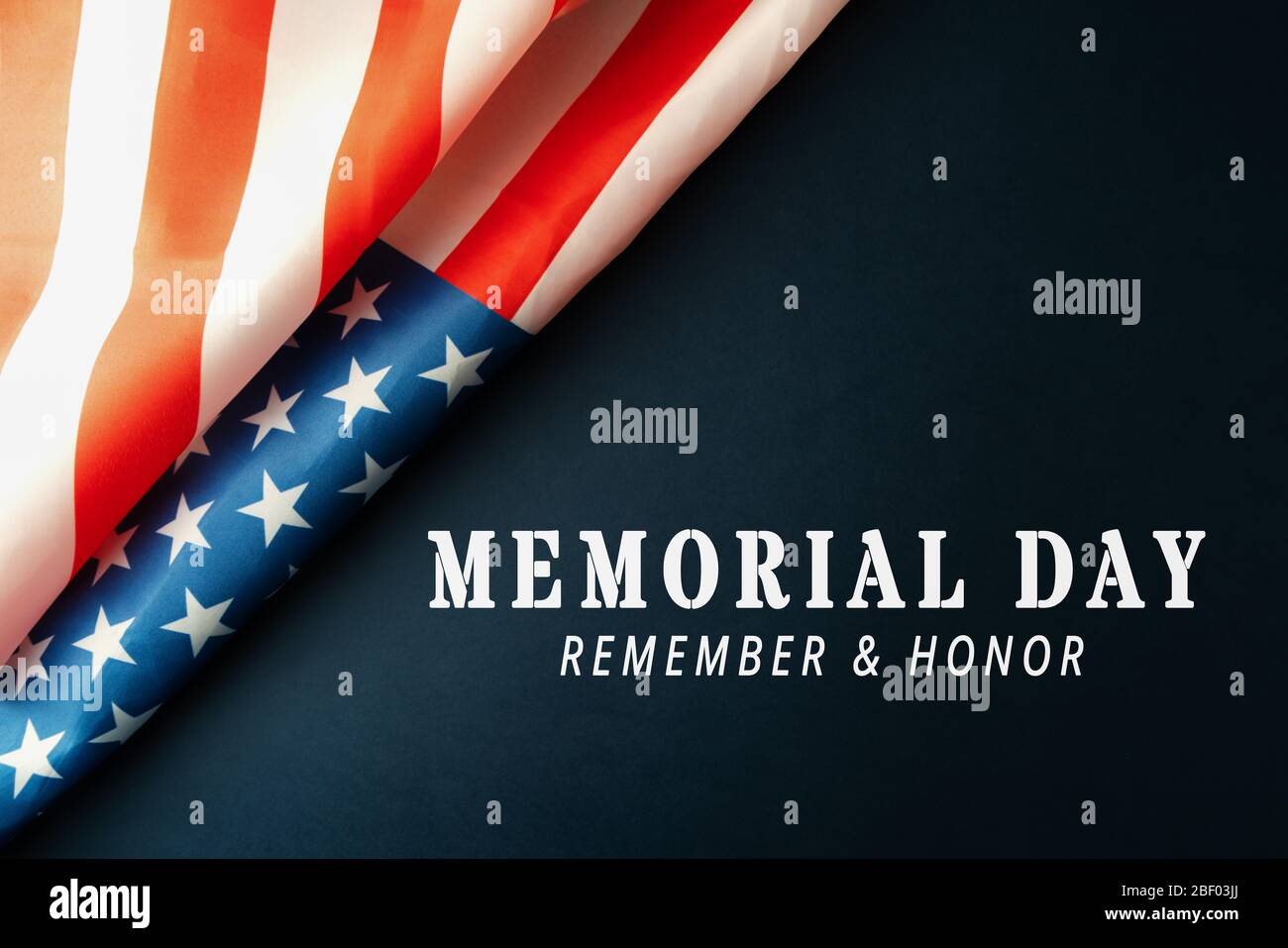 Memorial Day with American flag on blue background Stock Photo - Alamy