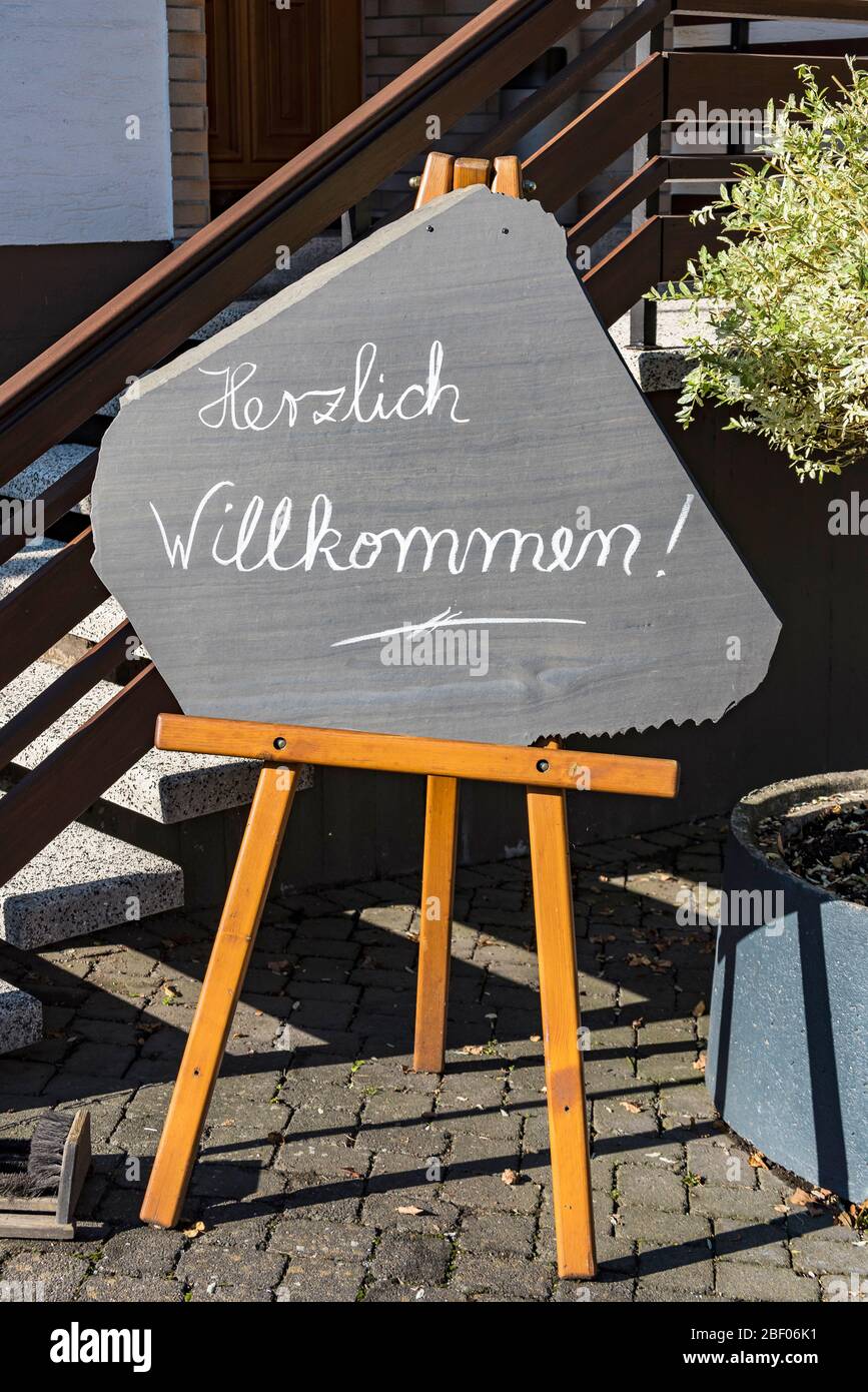 blackboard written with chalk with german lettering in low