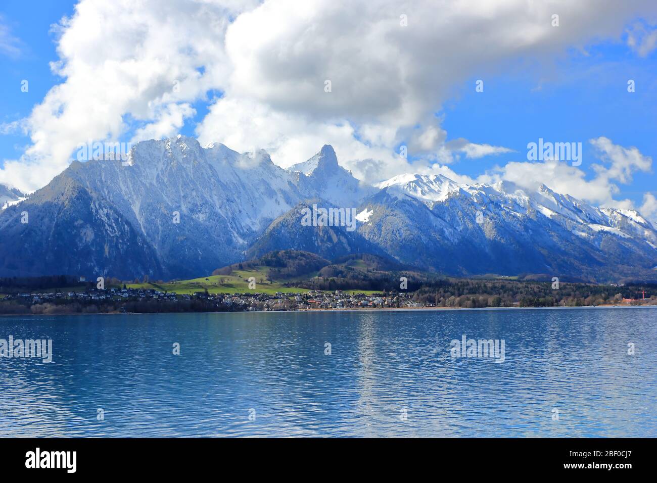 View of Bernese Alps from Oberhofen, located on the northern shore of Lake Thun. Switzerland, Europe. Stock Photo