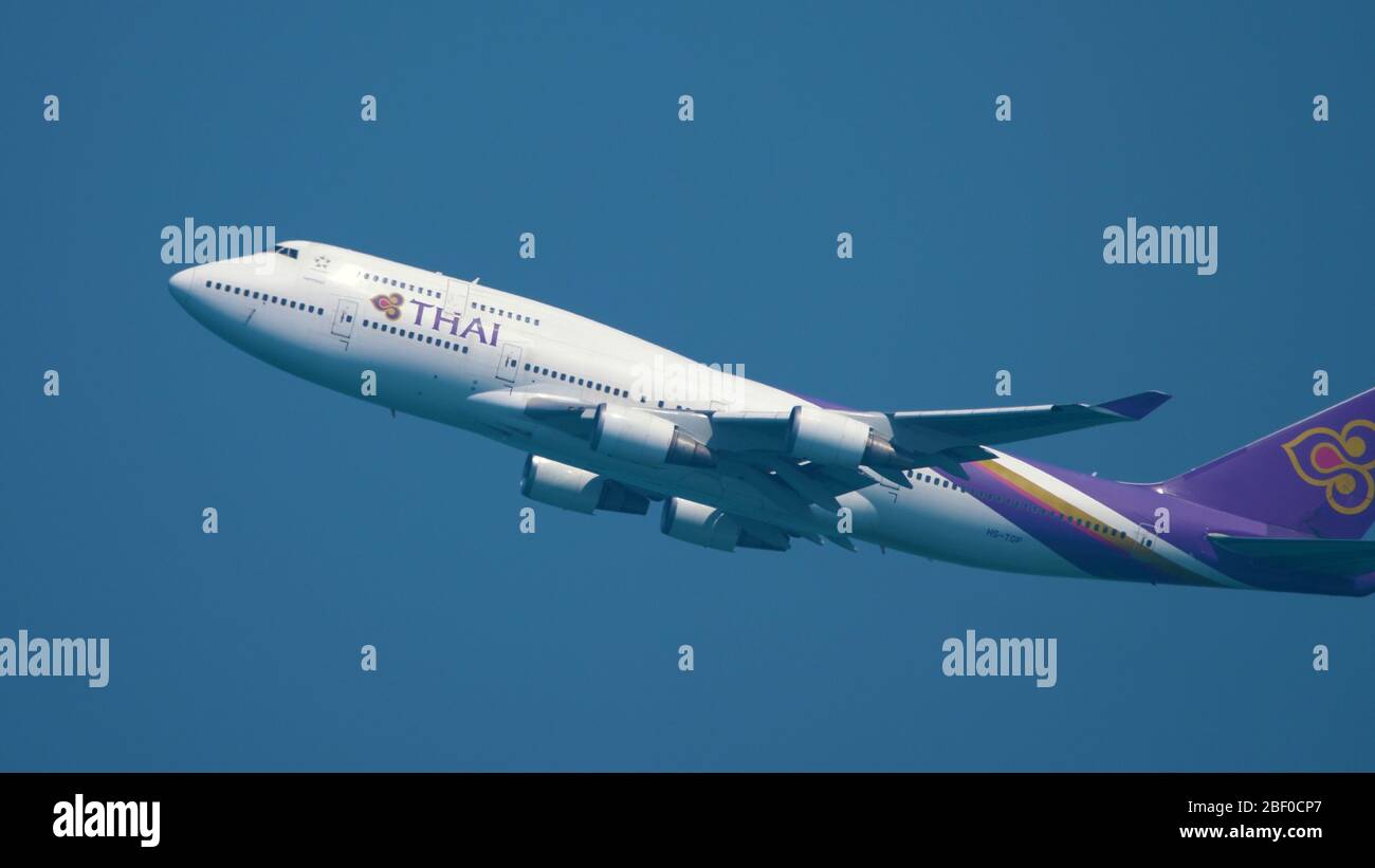 Airplane Boeing 747 climb Stock Photo