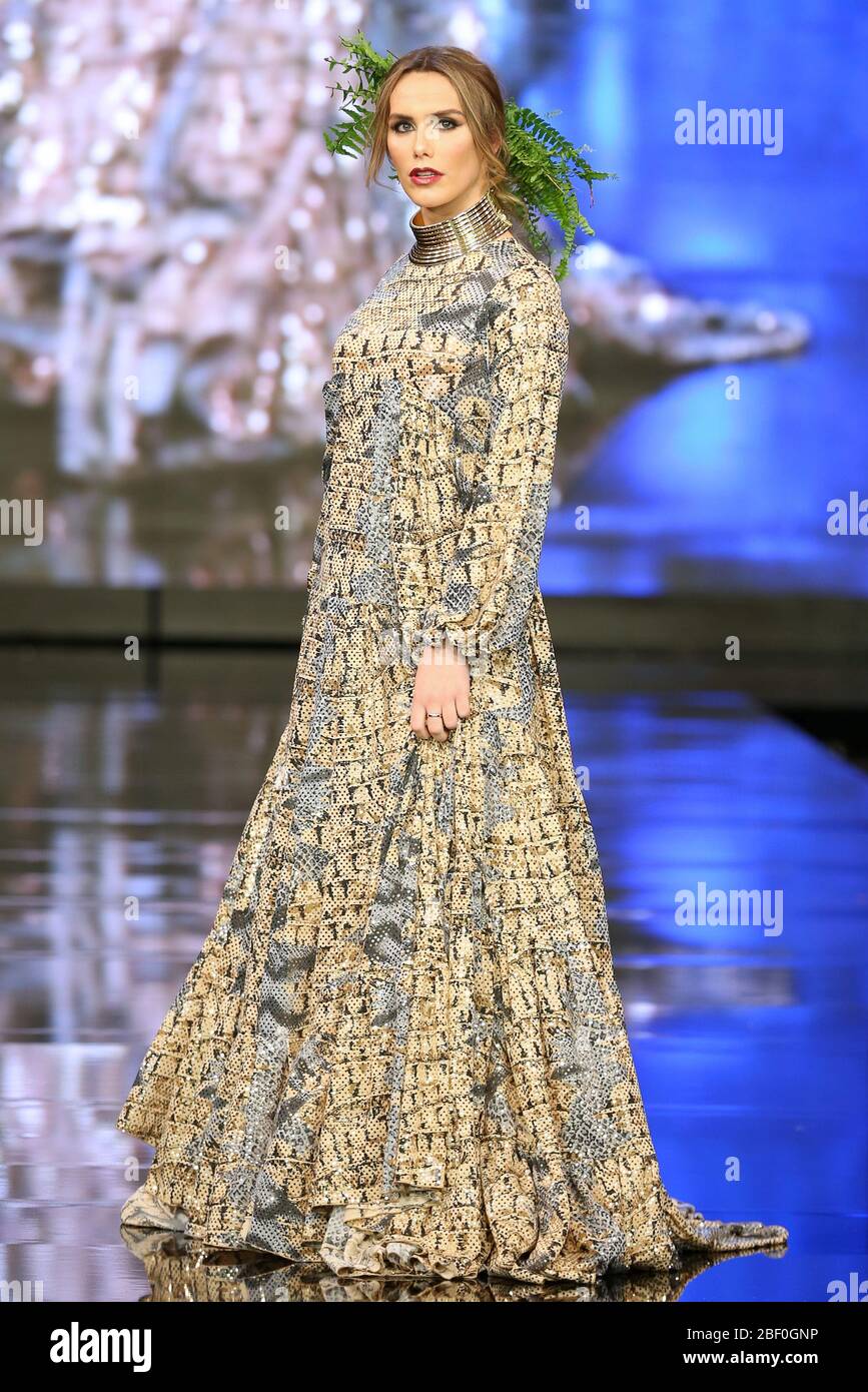 SEVILLA, SPAIN - JAN 30: Model wearing a dress from the Lyalodde collection by designer Agus Dorado as part of the SIMOF 2020 (Photo credit: Mickael Chavet) Stock Photo