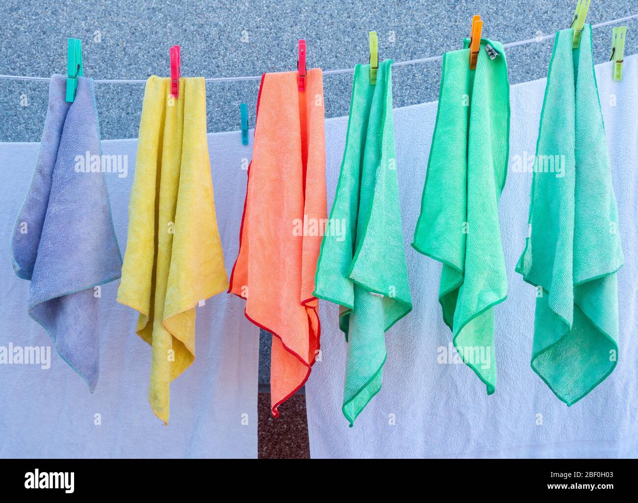 Dishcloths on washing line Stock Photo Alamy