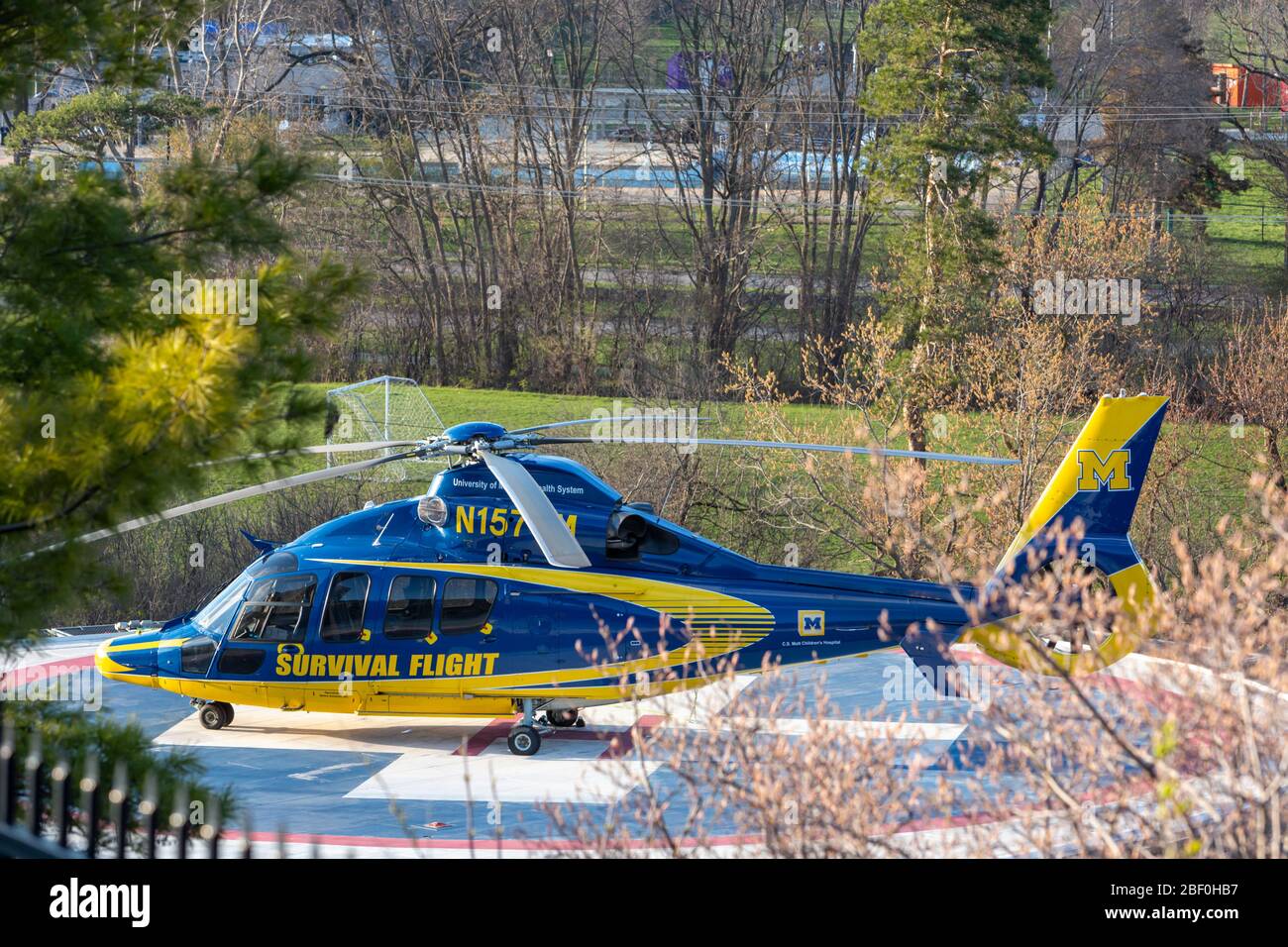 Ann Arbor, Michigan - A University of Michigan Health System air amulance helicopter on a helipad at the university's Medical Center. Stock Photo