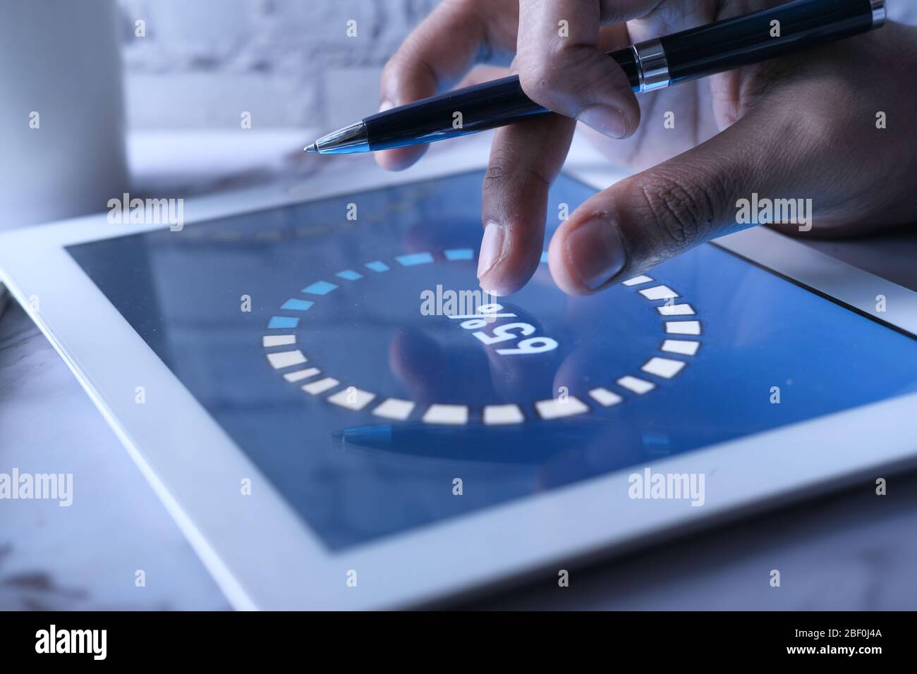 businessman analyzing financial data on digital tablet  Stock Photo