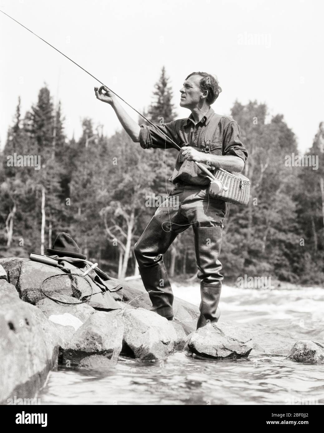 Old fashioned fishing basket hi-res stock photography and images