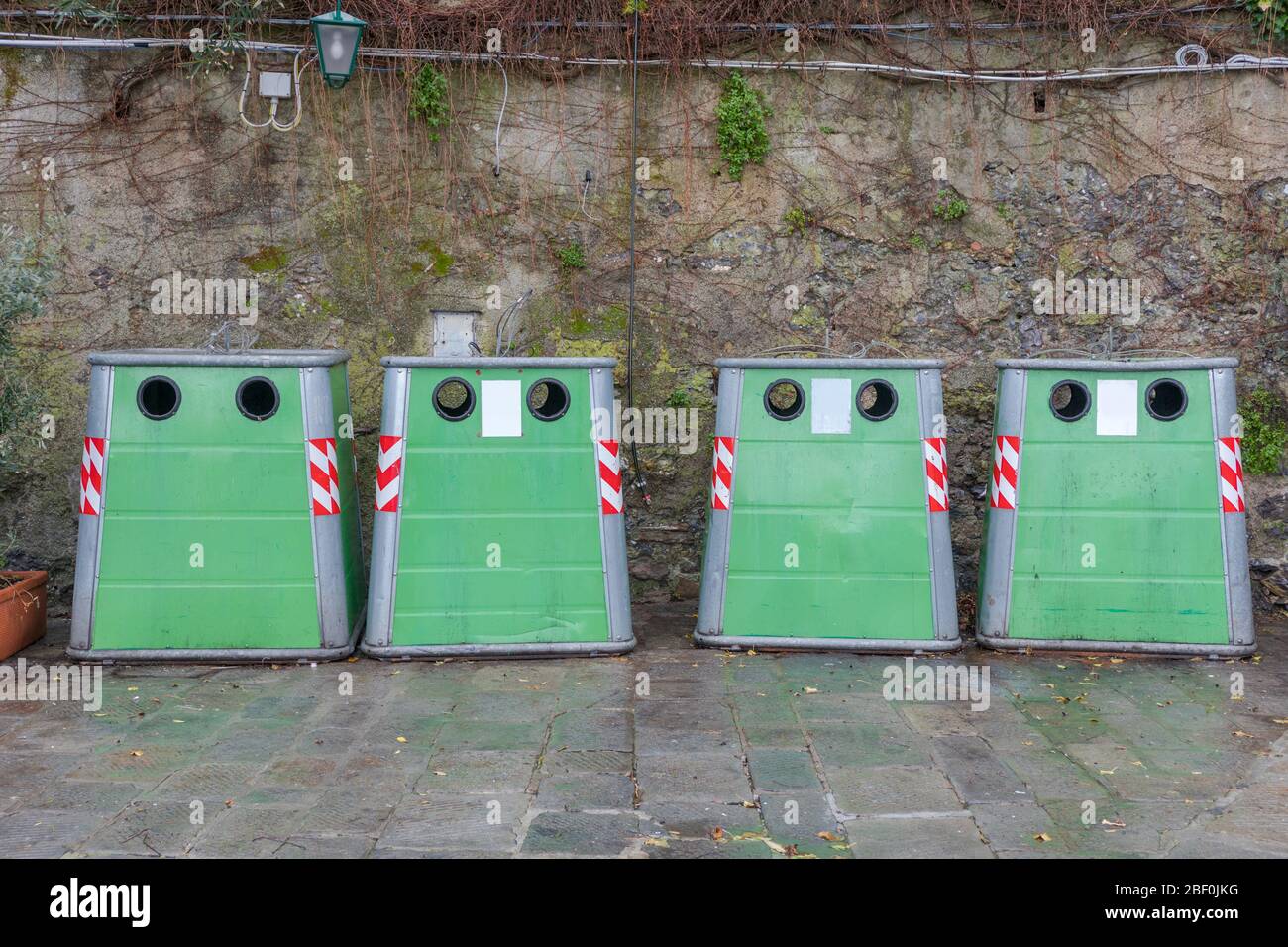 Four Collection Green Recycling Bins For Glass Stock Photo Alamy