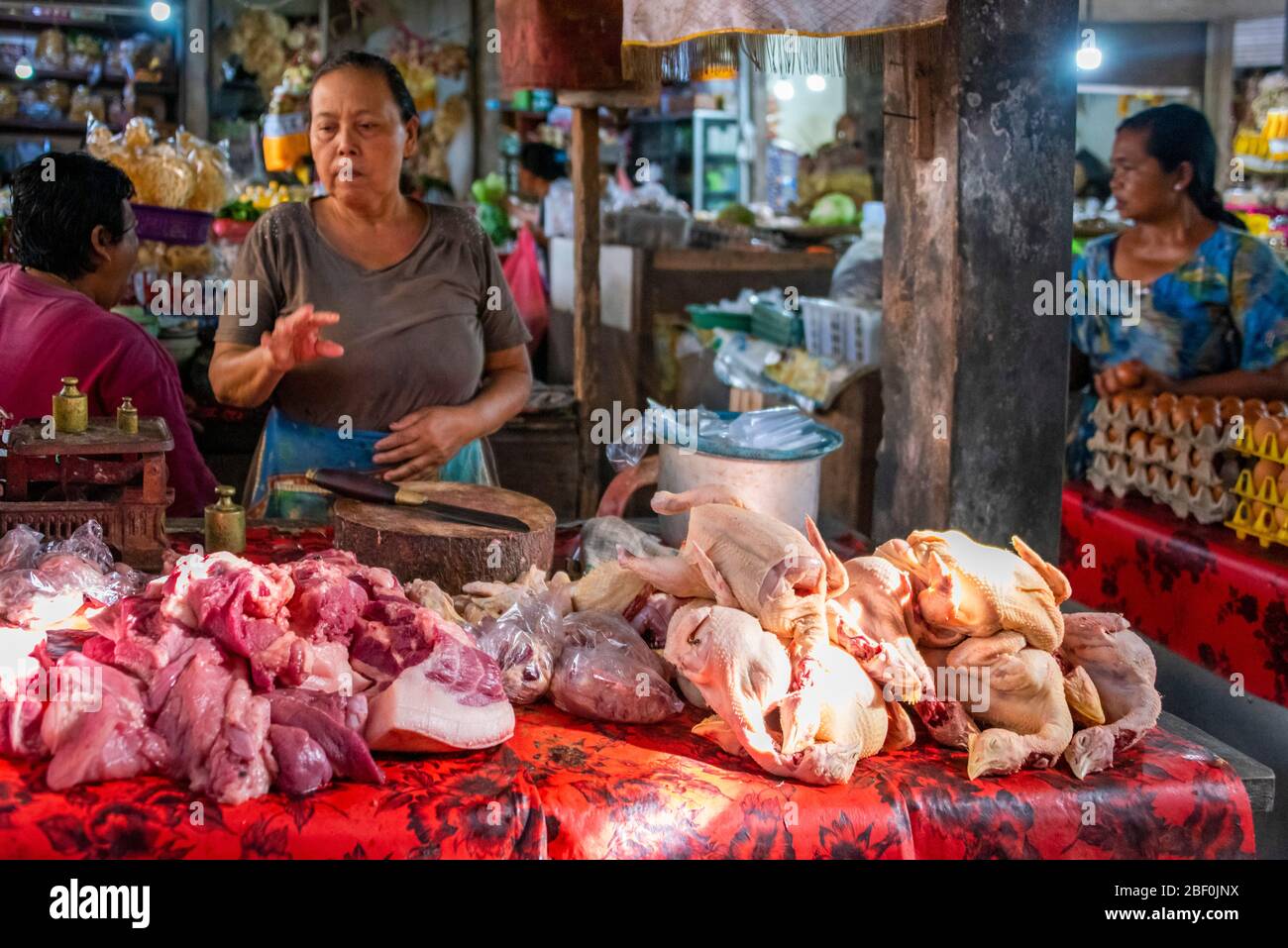 Horizontal view of a butcher's stall at Pejeng Wet Market in Bali, Indonesia. Stock Photo