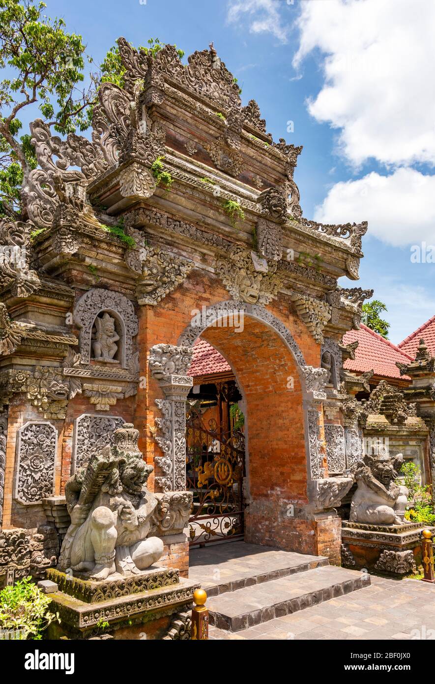 Vertical view of a traditional archway at Ubud palace in Bali, Indonesia. Stock Photo