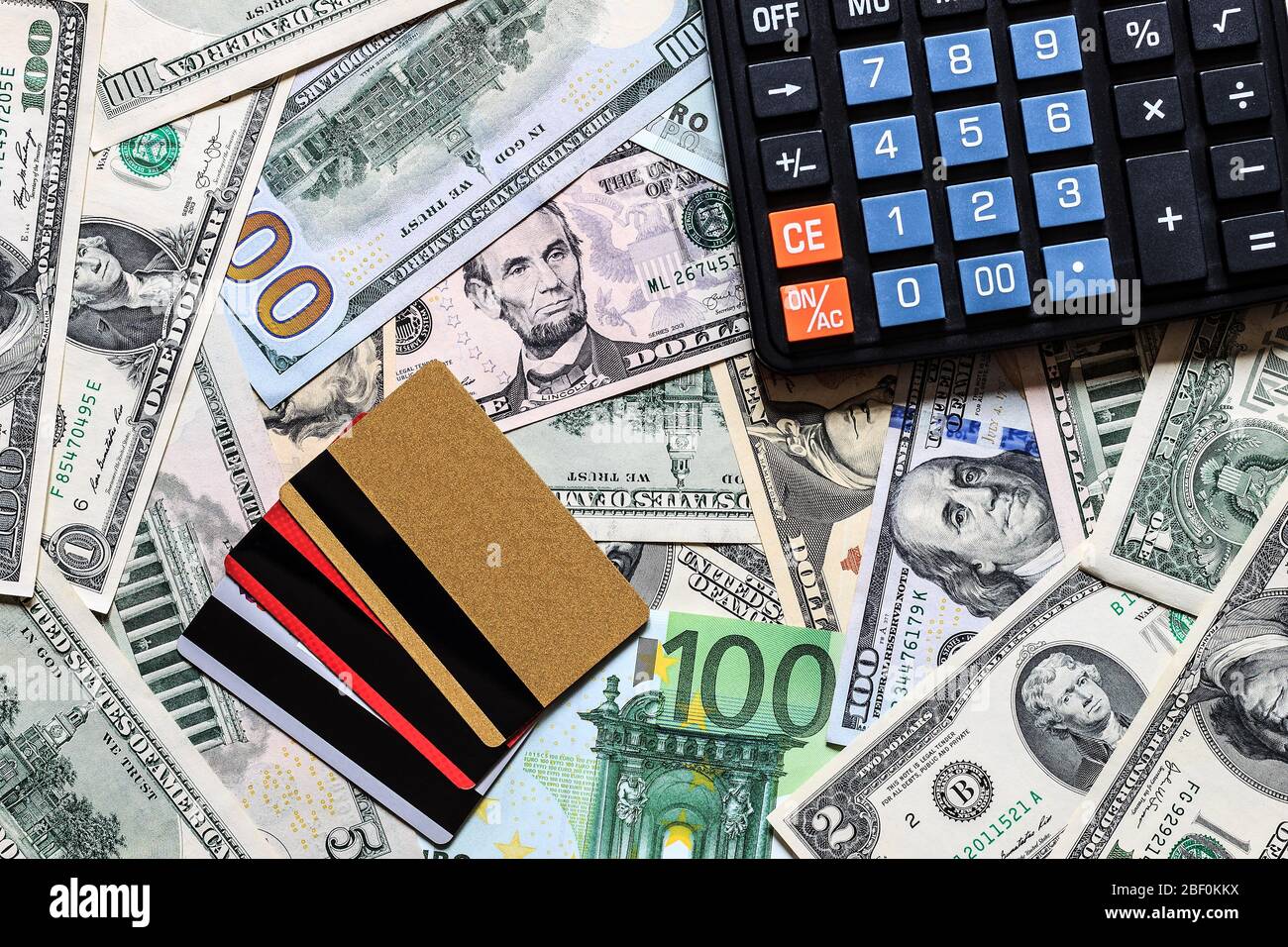 Background with money american dollar and euro bills, credit card and black  calculator. Cash money Stock Photo - Alamy