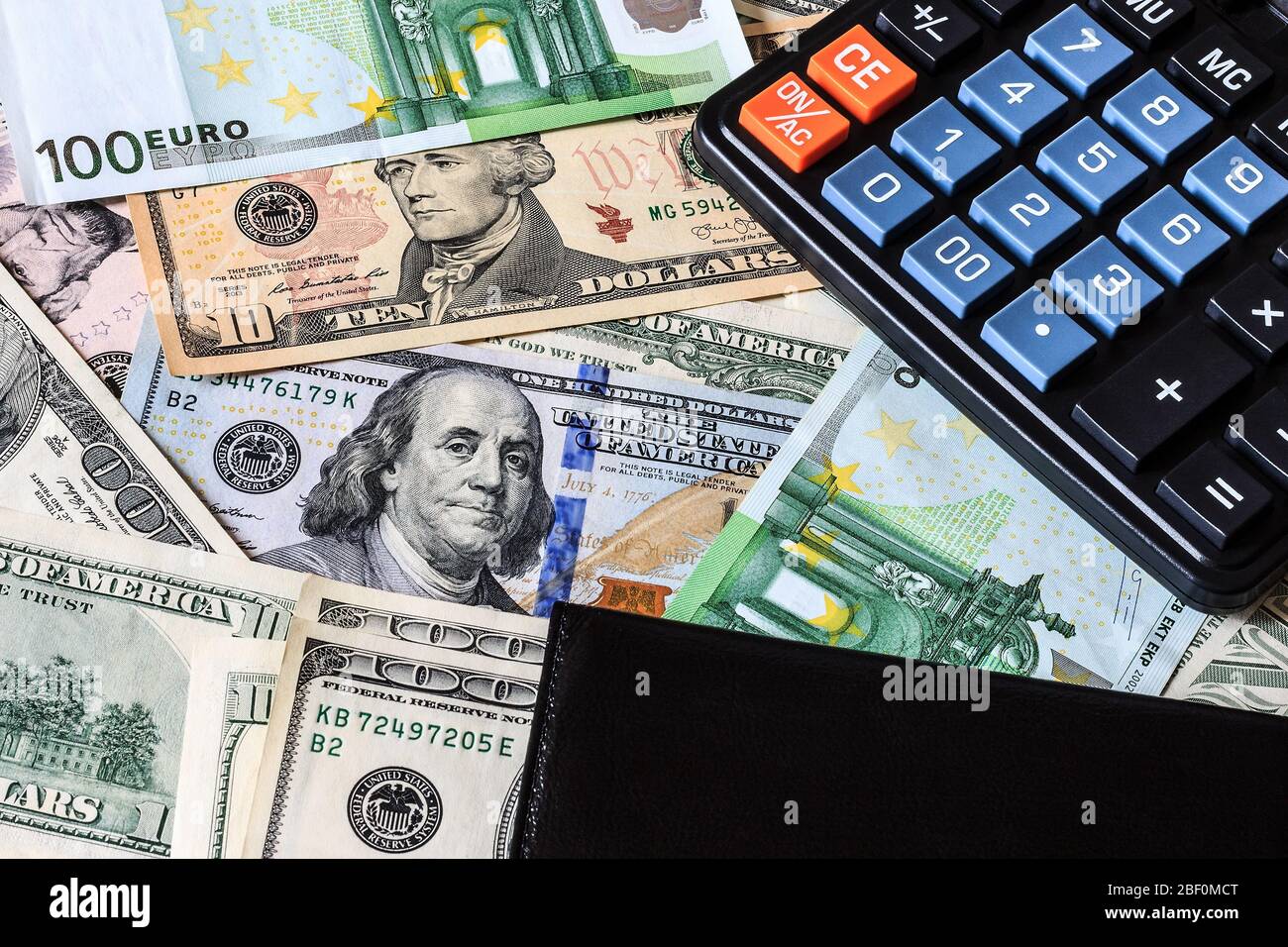 Background With Money American Dollar And Euro Bills And Black Leather Wallet With Calculator Cash Dollars And Euros Stock Photo Alamy