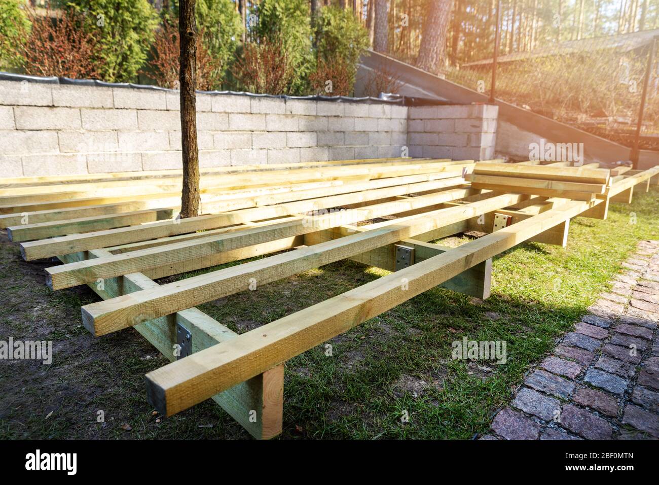 backyard terrace construction - wooden frame for patio deck Stock Photo