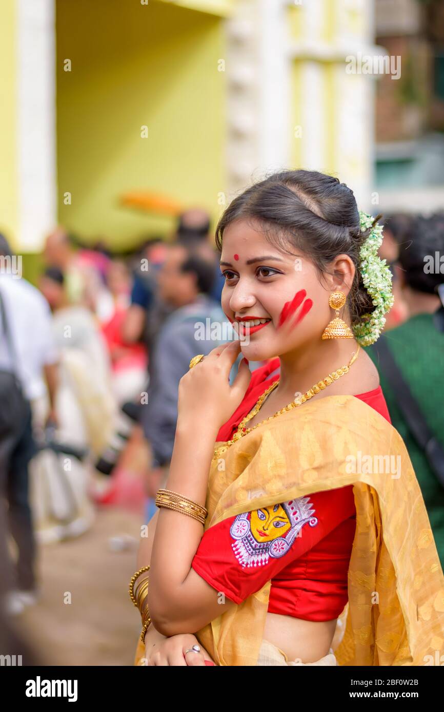 Women participate in Sindur Khela at a puja pandal on the last day of Durga puja at Baghbazar Sarbojanin in Kolkata on October 2019 Stock Photo