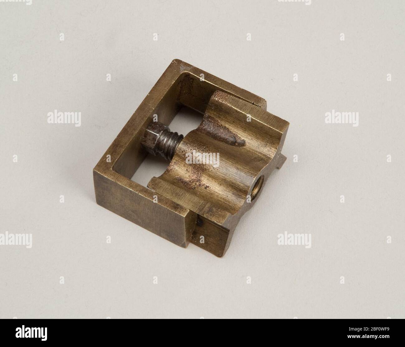 Patent model for printers quoins. This patent model demonstrates an invention for a screw quoin