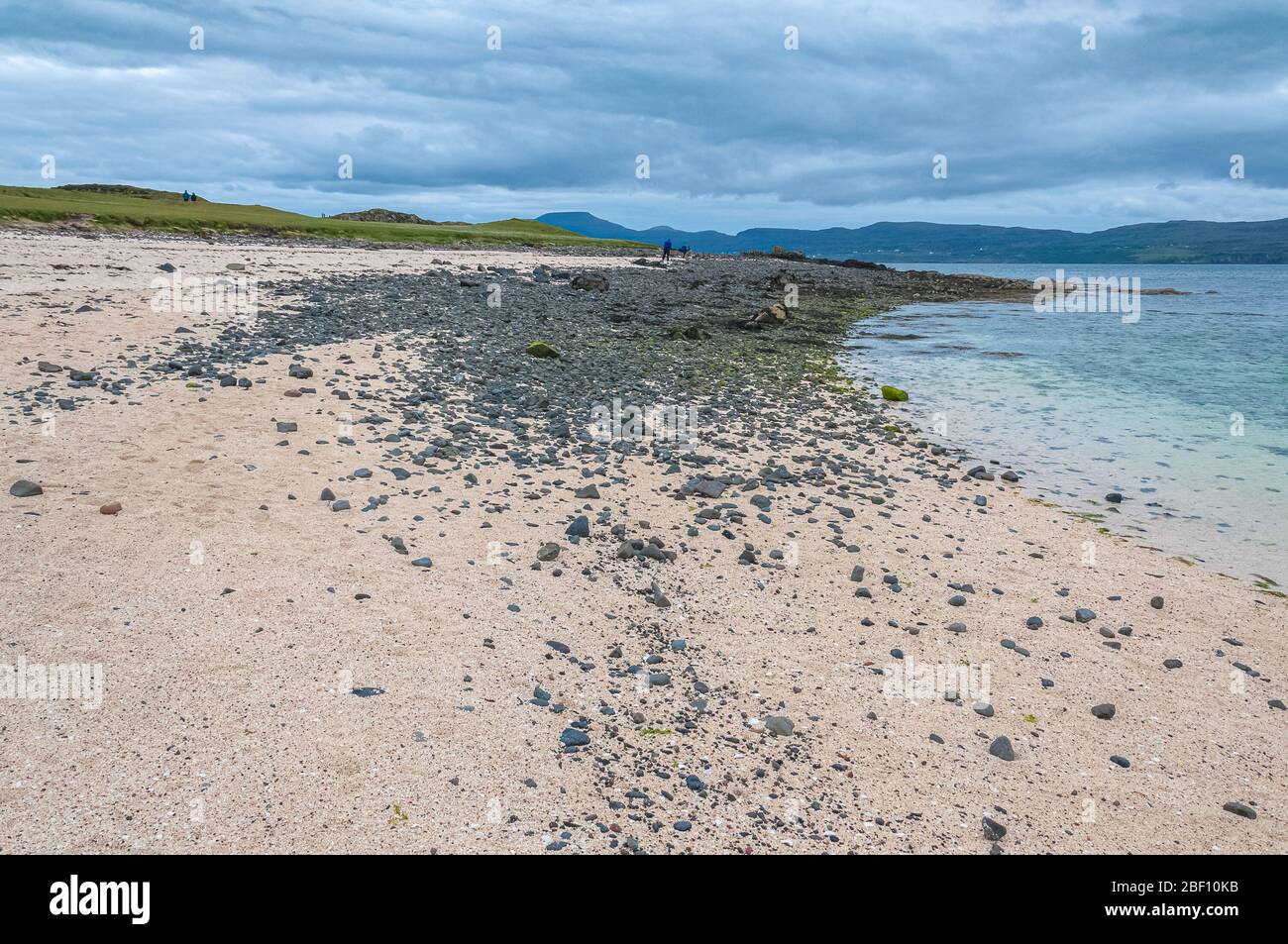 White beach with black stones, Coral Beach, Isle of Skye, Scotland Stock Photo