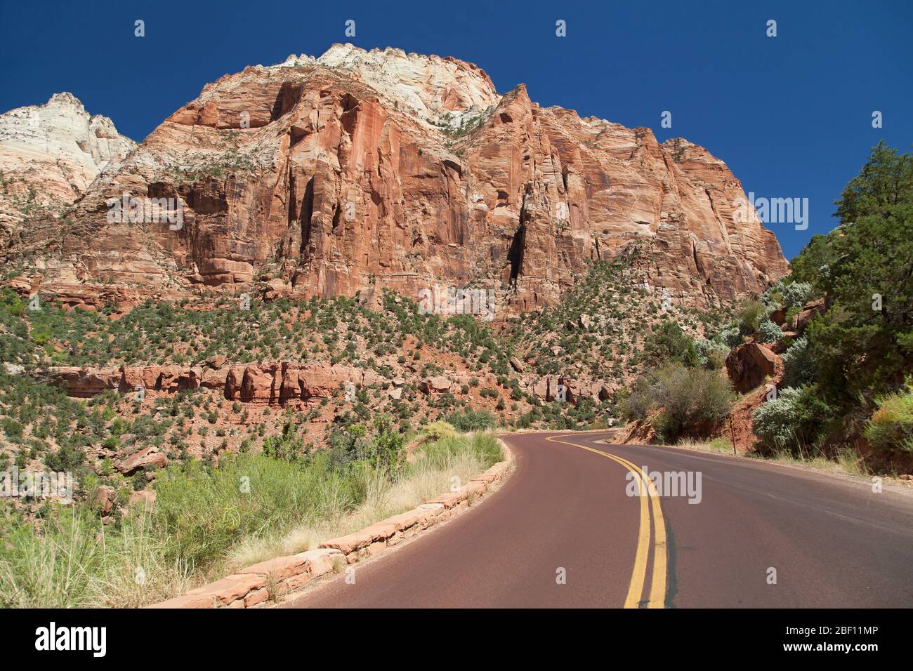 Zion Mount Carmel Highway with the East Temple in the background, Zion National Park, Utah, USA. Stock Photo