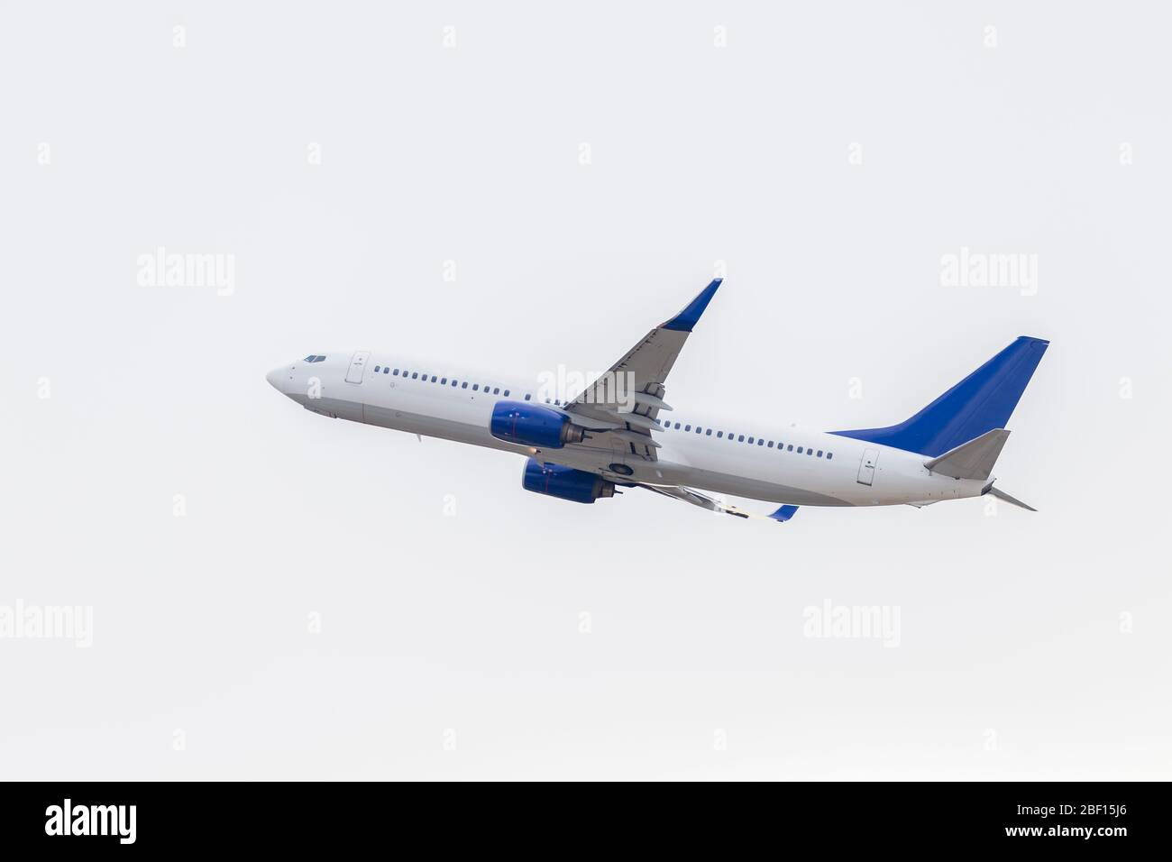 White passenger plane taking off stock photo alamy