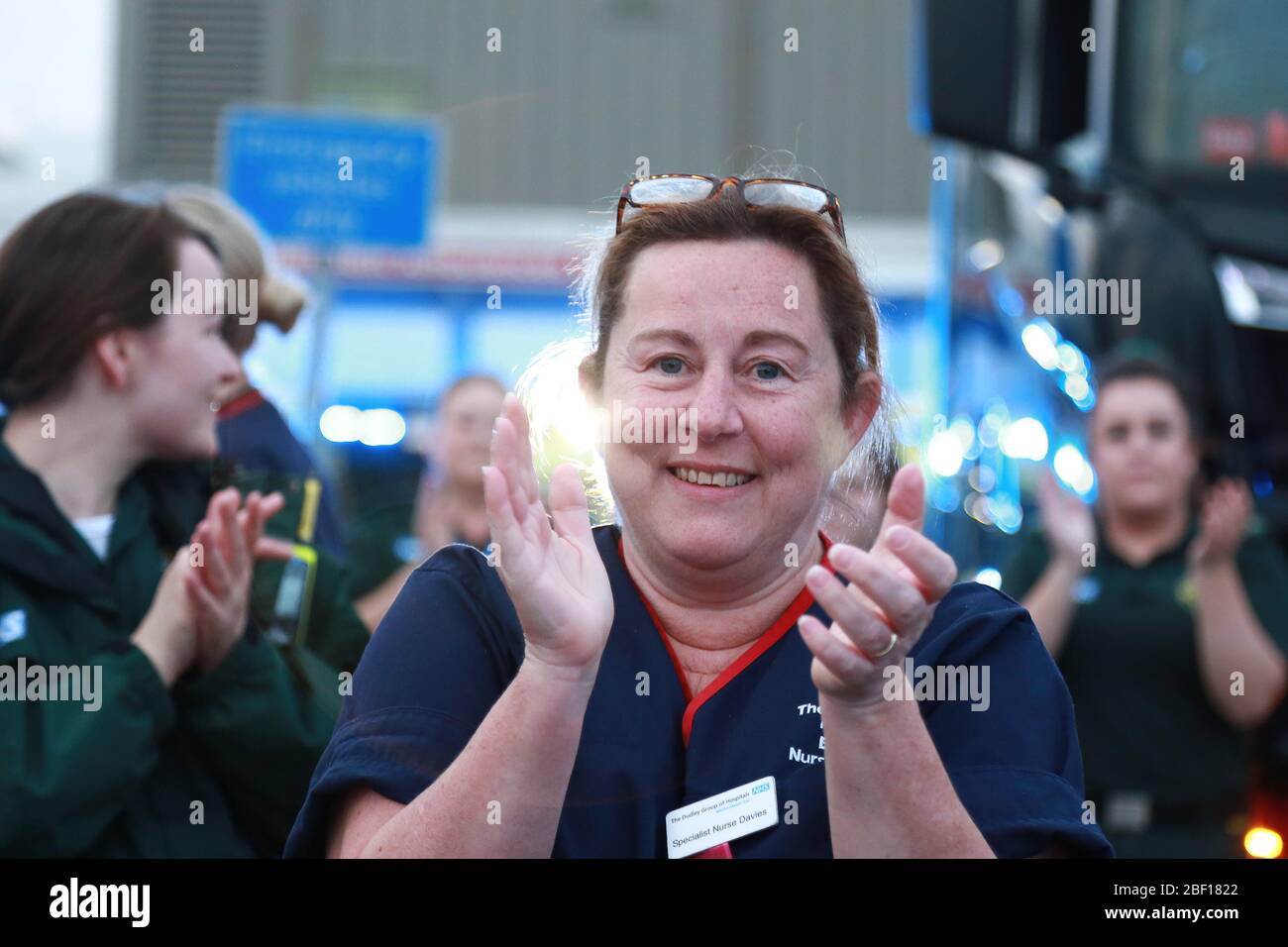 Dudley, West Midlands, UK. 16th Apr, 2020. Nurses and NHS staff were joined by public and emergency services at Russells Hall hospital in Dudley, West Midlands for the clap for carers and NHS frontline workers. Credit: Peter Lopeman/Alamy Live News Stock Photo