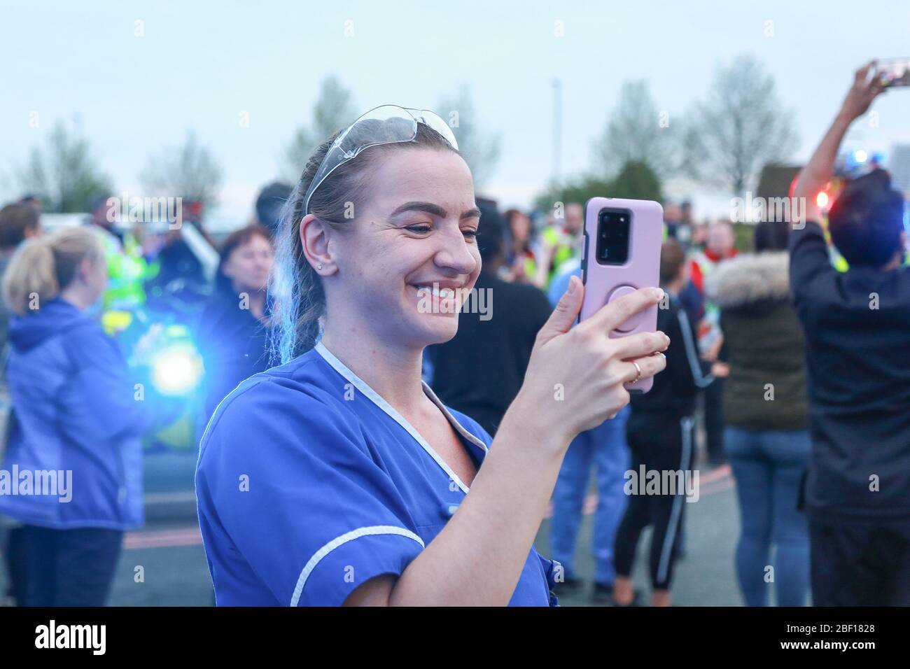 Dudley, West Midlands, UK. 16th Apr, 2020. Nurses and NHS staff were joined by public and emergency services at Russells Hall hospital in Dudley, West Midlands for the clap for carers and NHS frontline workers. Credit: Peter Lopeman/Alamy Live News Stock Photo