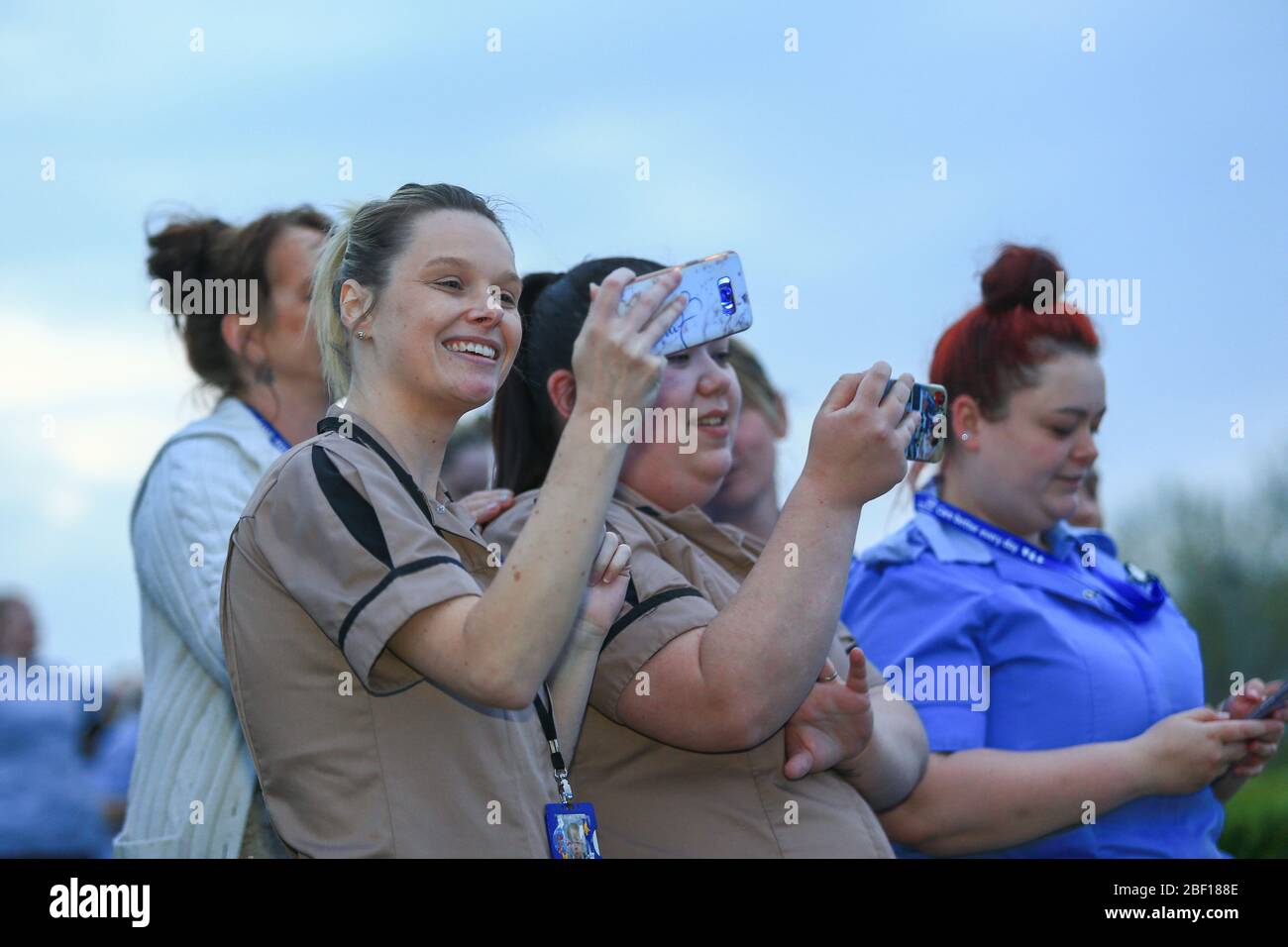 Dudley, West Midlands, UK. 16th Apr, 2020. Nurses and NHS staff were joined by public and emergency services at Russells Hall hospital in Dudley, West Midlands for the clap for carers and NHS frontline workers. Credit: Peter Lopeman/Alamy Live News Stock Photo