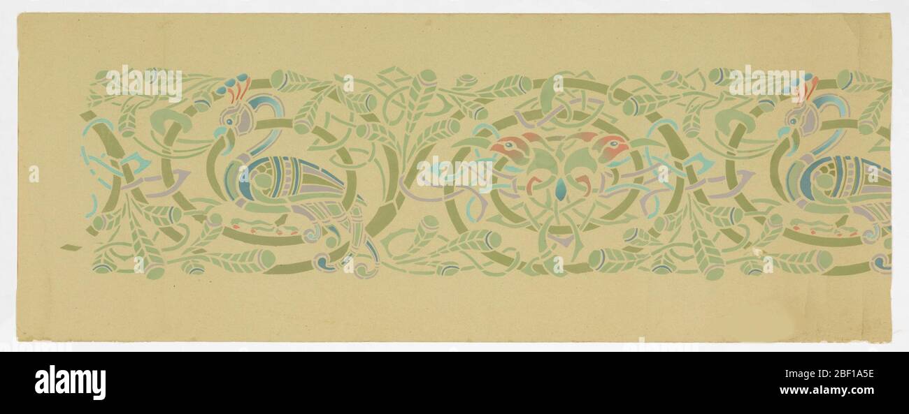 Frieze. Celtic design. Continuous foliate rinceau, the scrolls of which enframe alternately two major motifs (a) a peacock in profile; (b) the heads of two birds addorsed. Greens predominate with lesser amounts of blue, lavender and red. Interlacings. Stock Photo