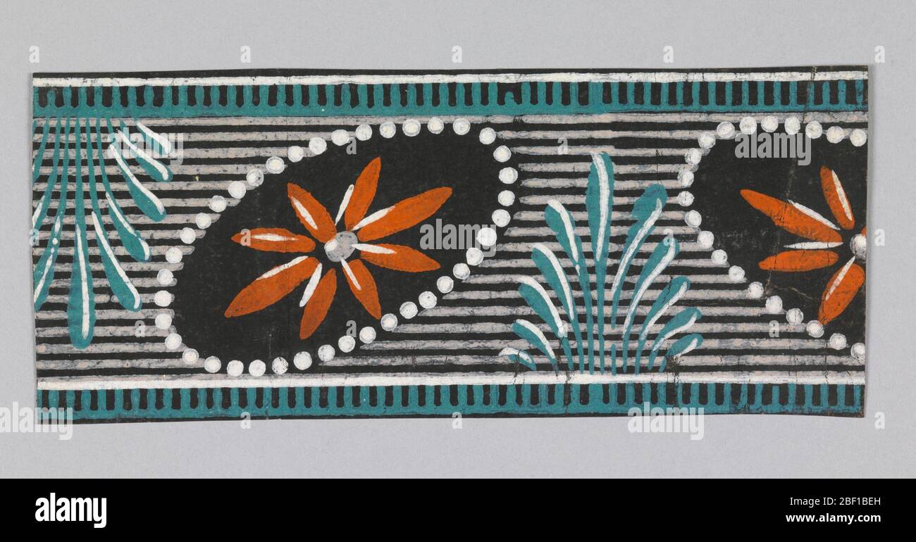 Border. Edging top and bottom of center band, a dentelle pattern. Center band contains oval medallions alternating (in the opposite diagonal placement) with stylized leaf clusters. Stock Photo